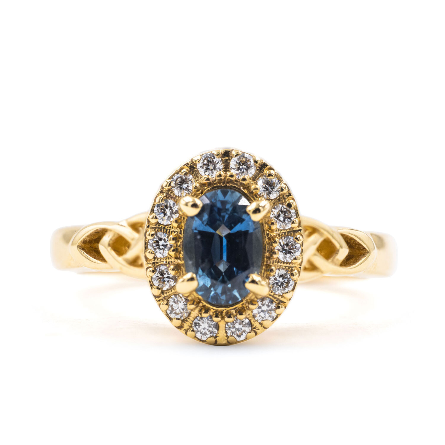 Oval Halo Trinity Knot Ring