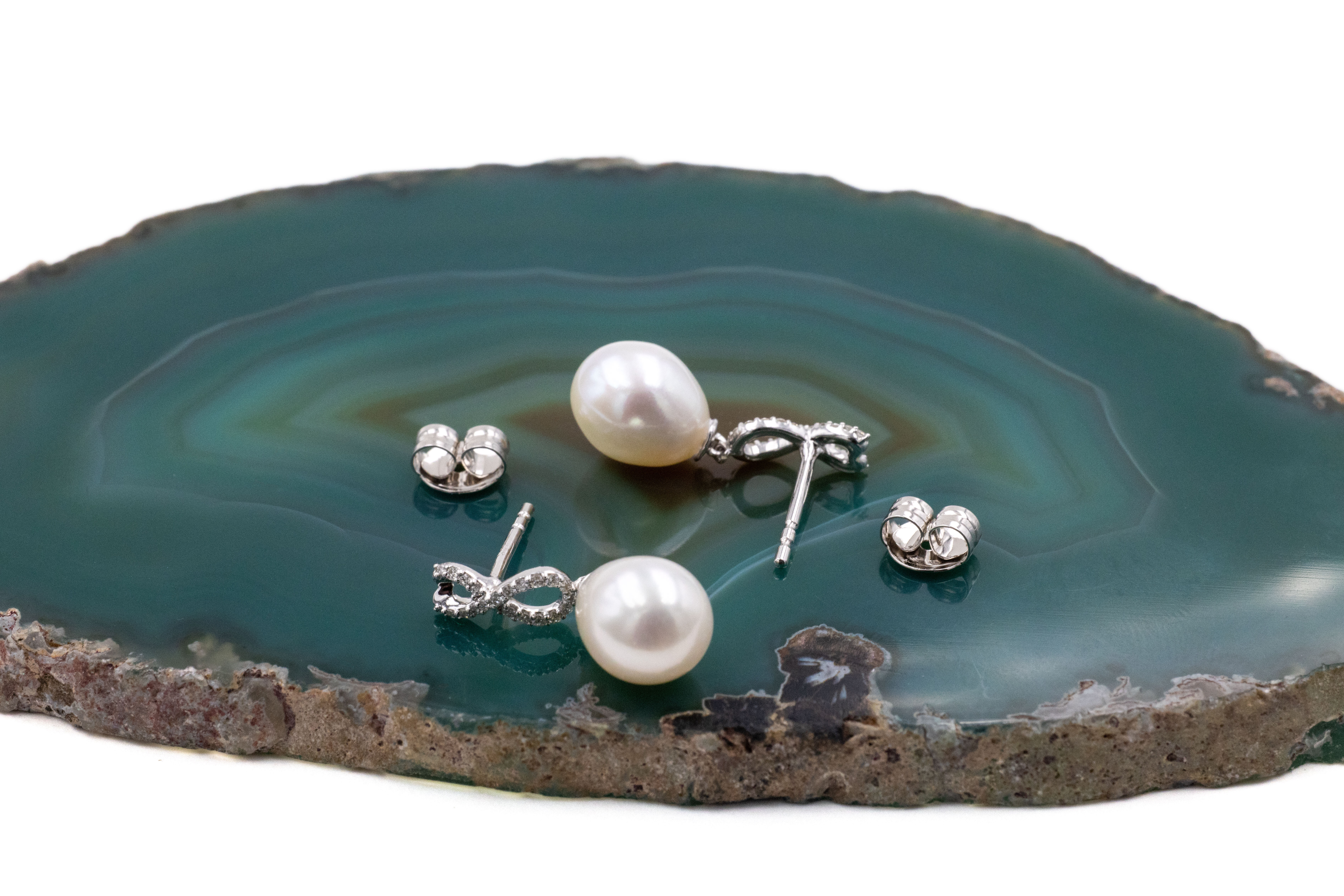 Genuine 9K White Gold Celtic Knot Earrings For Women With a Polished Finish