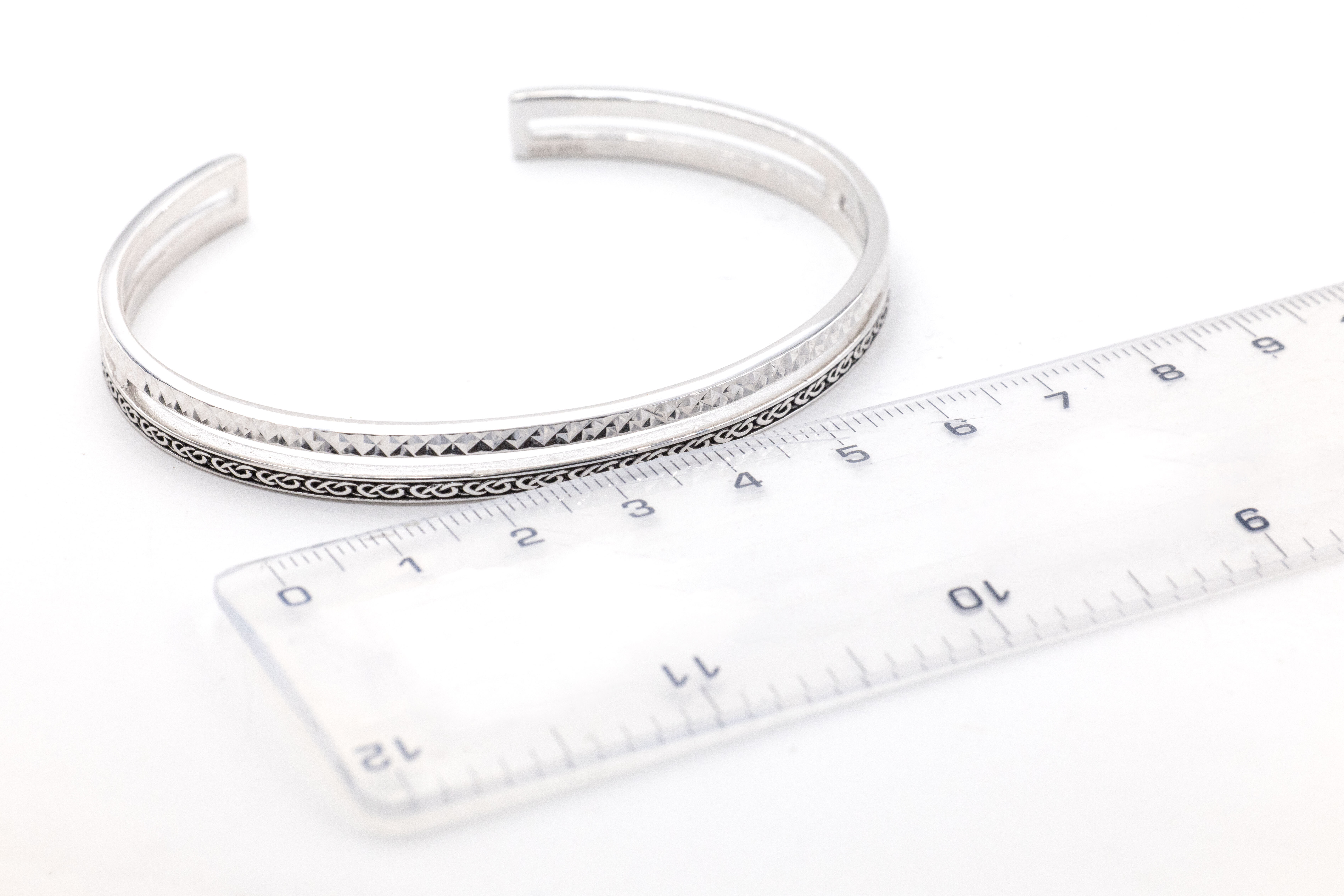 Real Sterling Silver Celtic Knot Bracelet For Women With a Oxidized Finish. Picture For Scale.