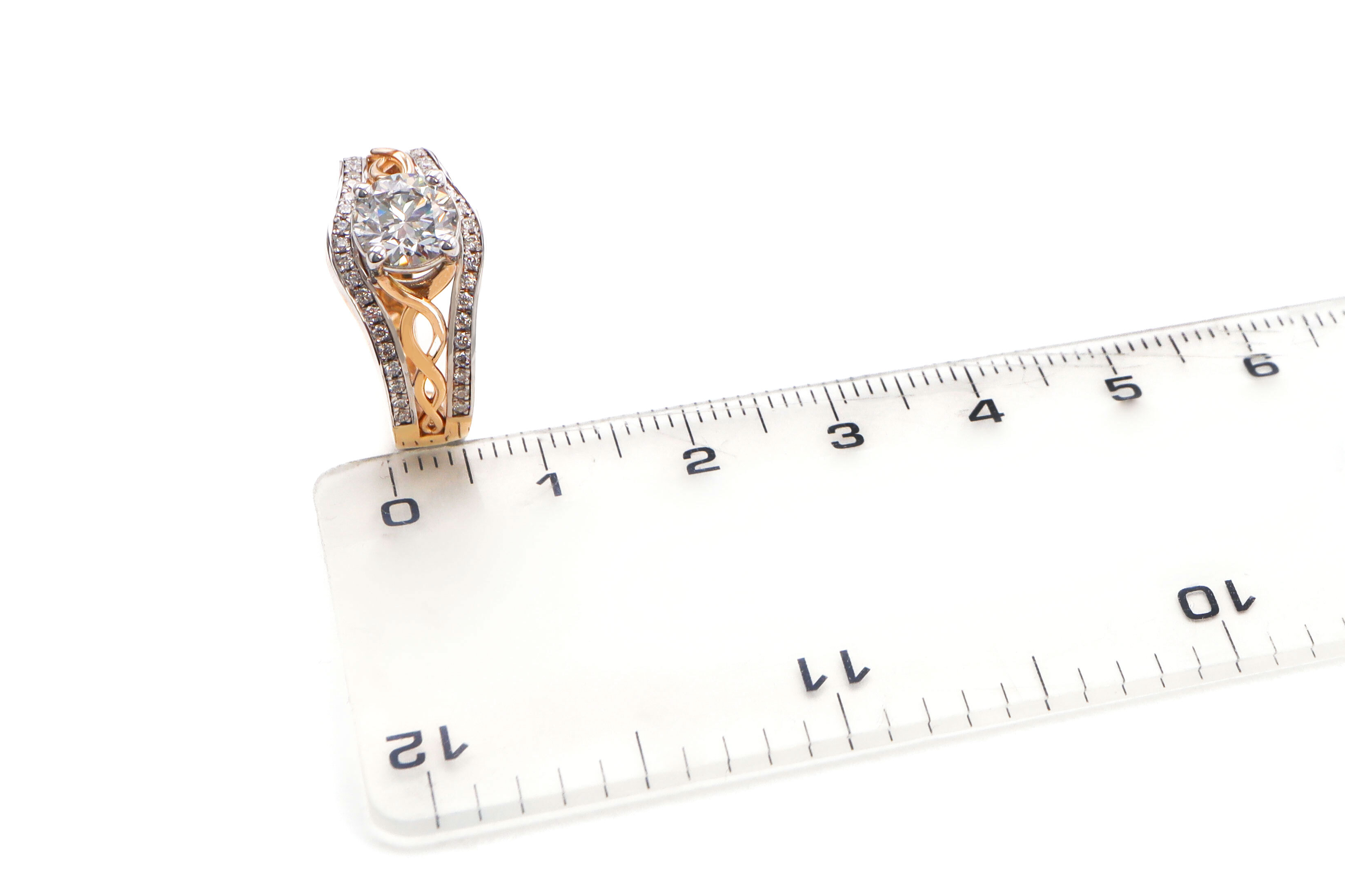 Attractive 14K Yellow Gold & White Gold Celtic Knot Ring For Women With a Polished Finish. Picture For Scale.