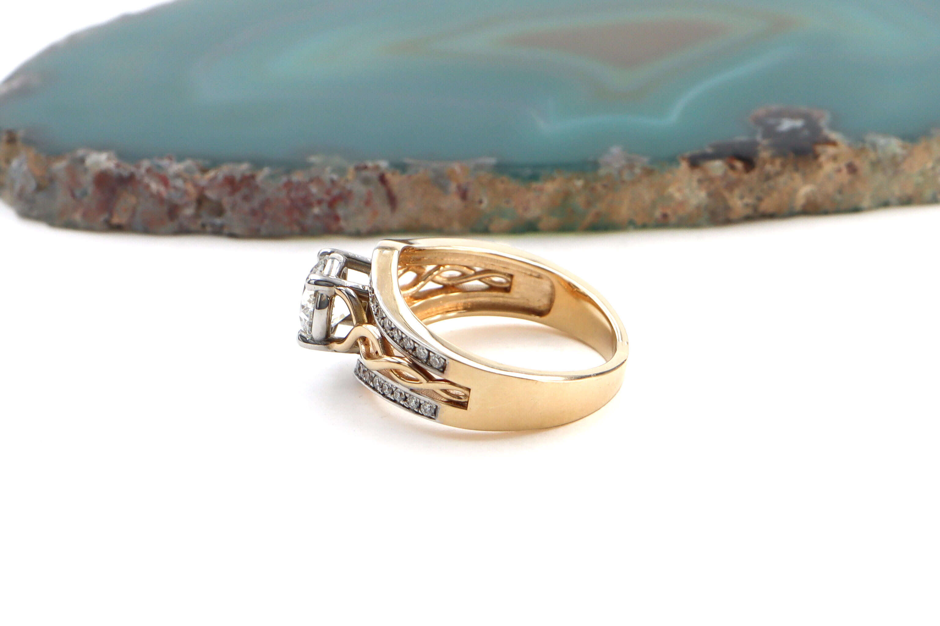 Attractive 14K Yellow Gold & White Gold Celtic Knot Ring With a Polished Finish For Women. Side View.