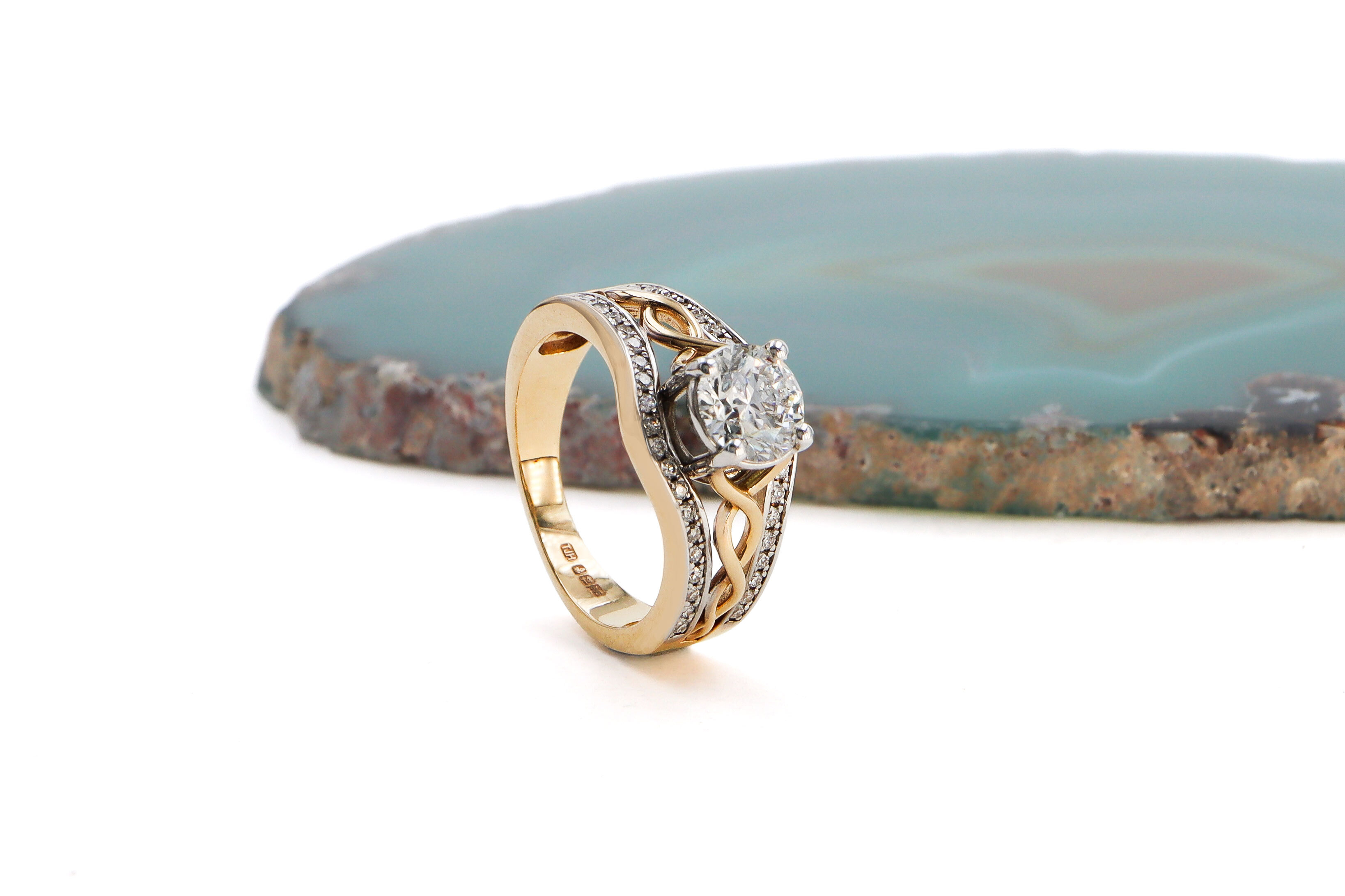 Striking Yellow Gold & White Gold Celtic Knot Engagement Ring With a Polished Finish For Women. Side View.