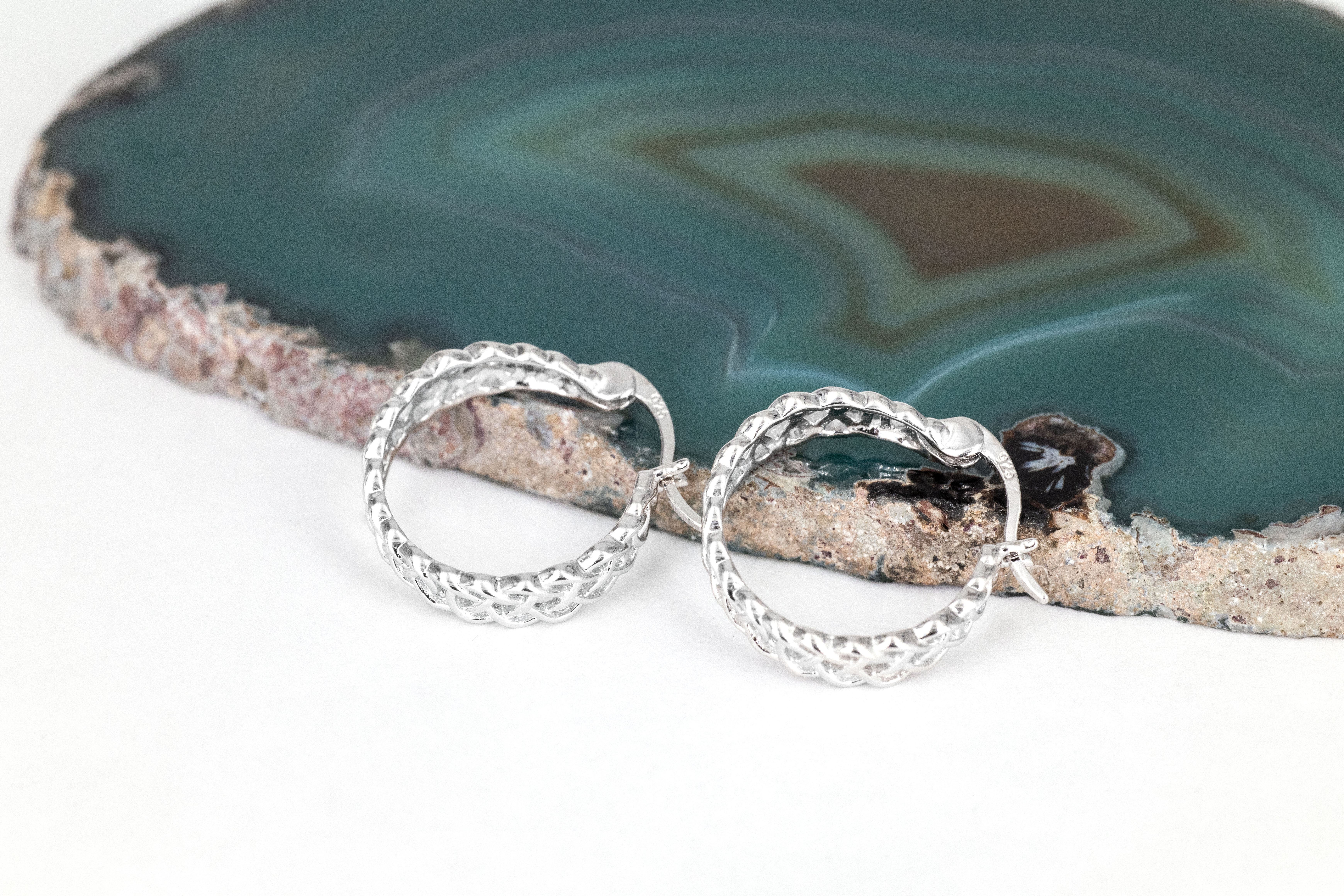 Attractive Sterling Silver Celtic Knot Earrings For Women With a Polished Finish. Side View.