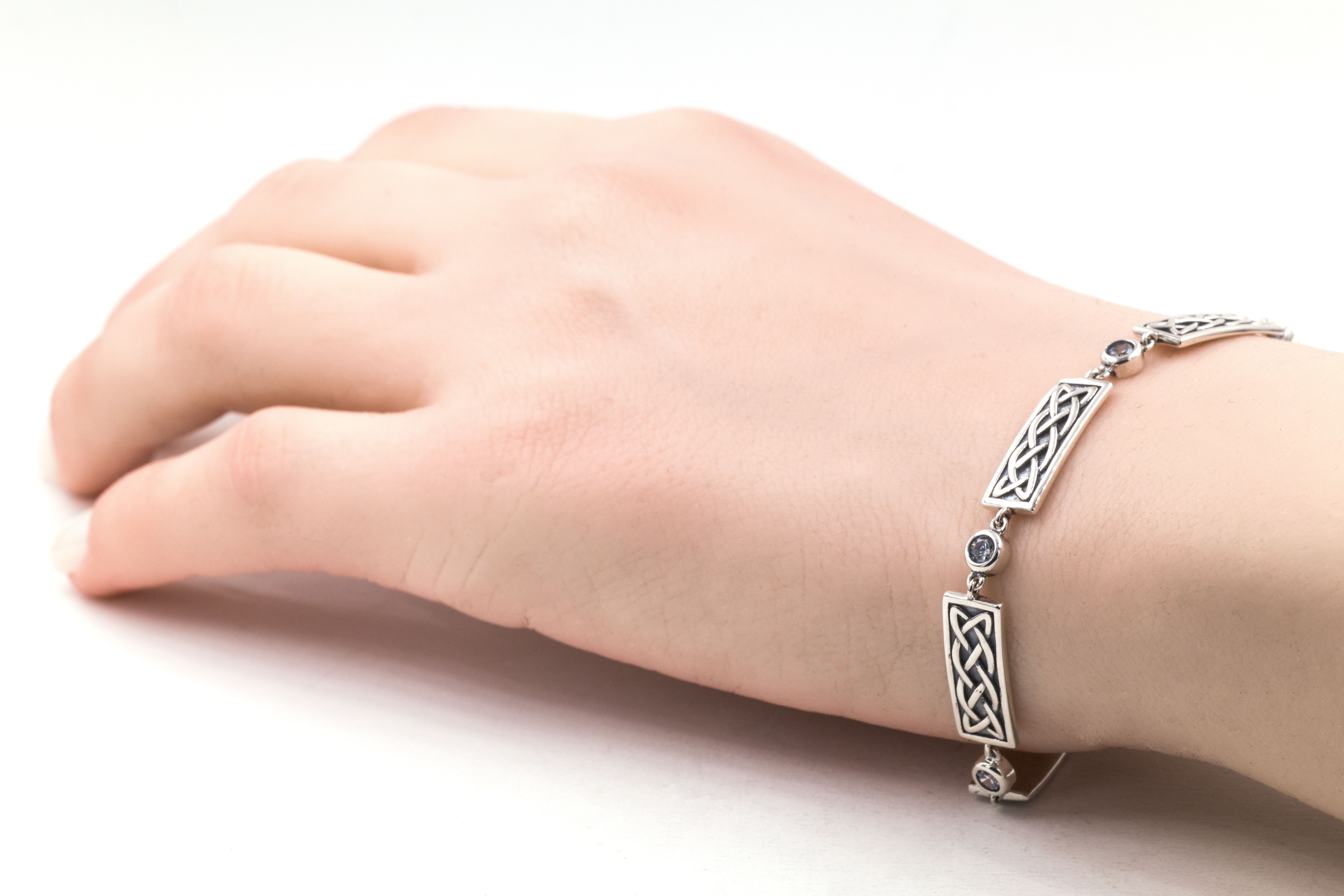 Irish Sterling Silver Celtic Knot Bracelet For Women With a Oxidized Finish - Model Photo