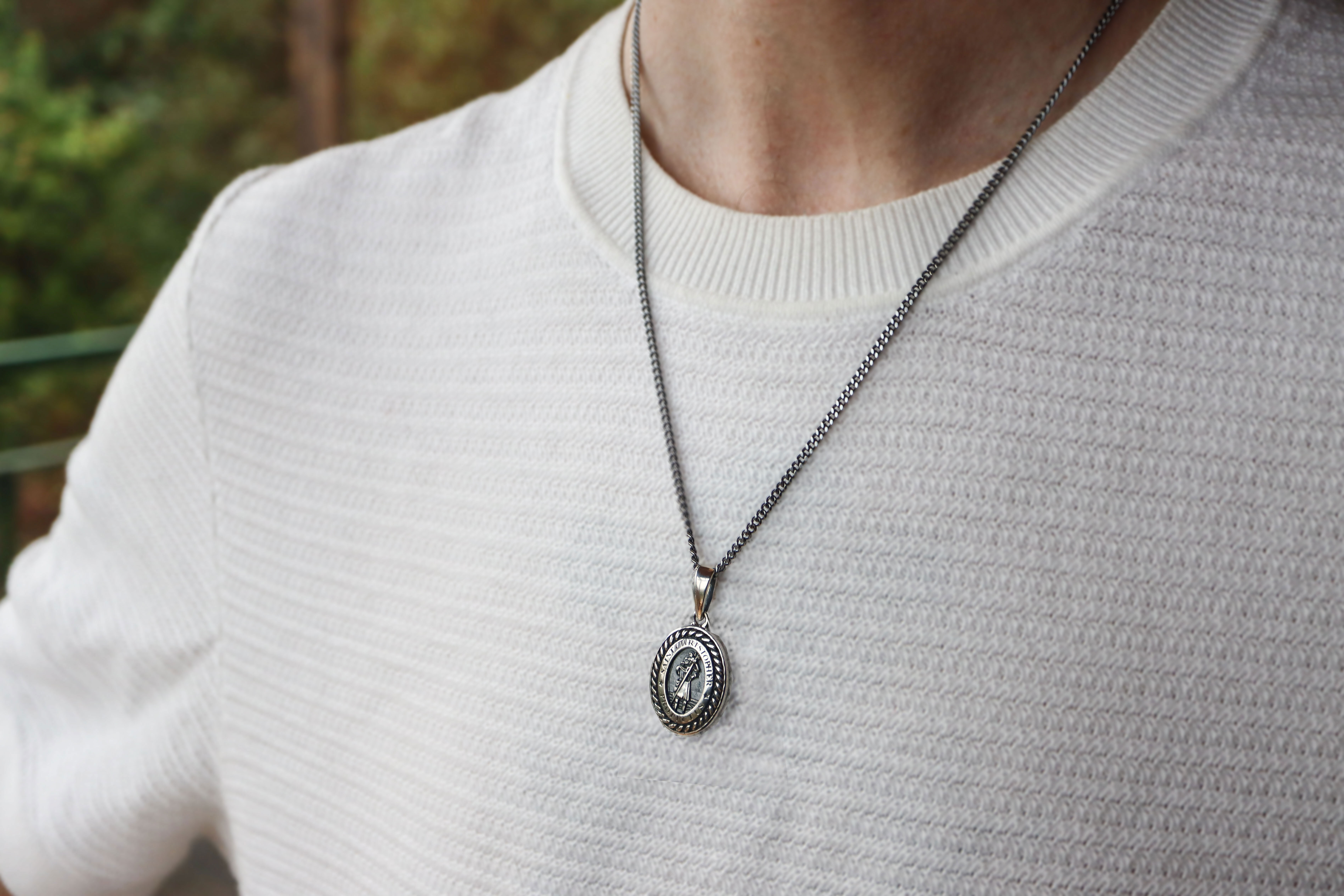 St Christopher Necklace in Sterling Silver With a Oxidized Finish - Model Photo