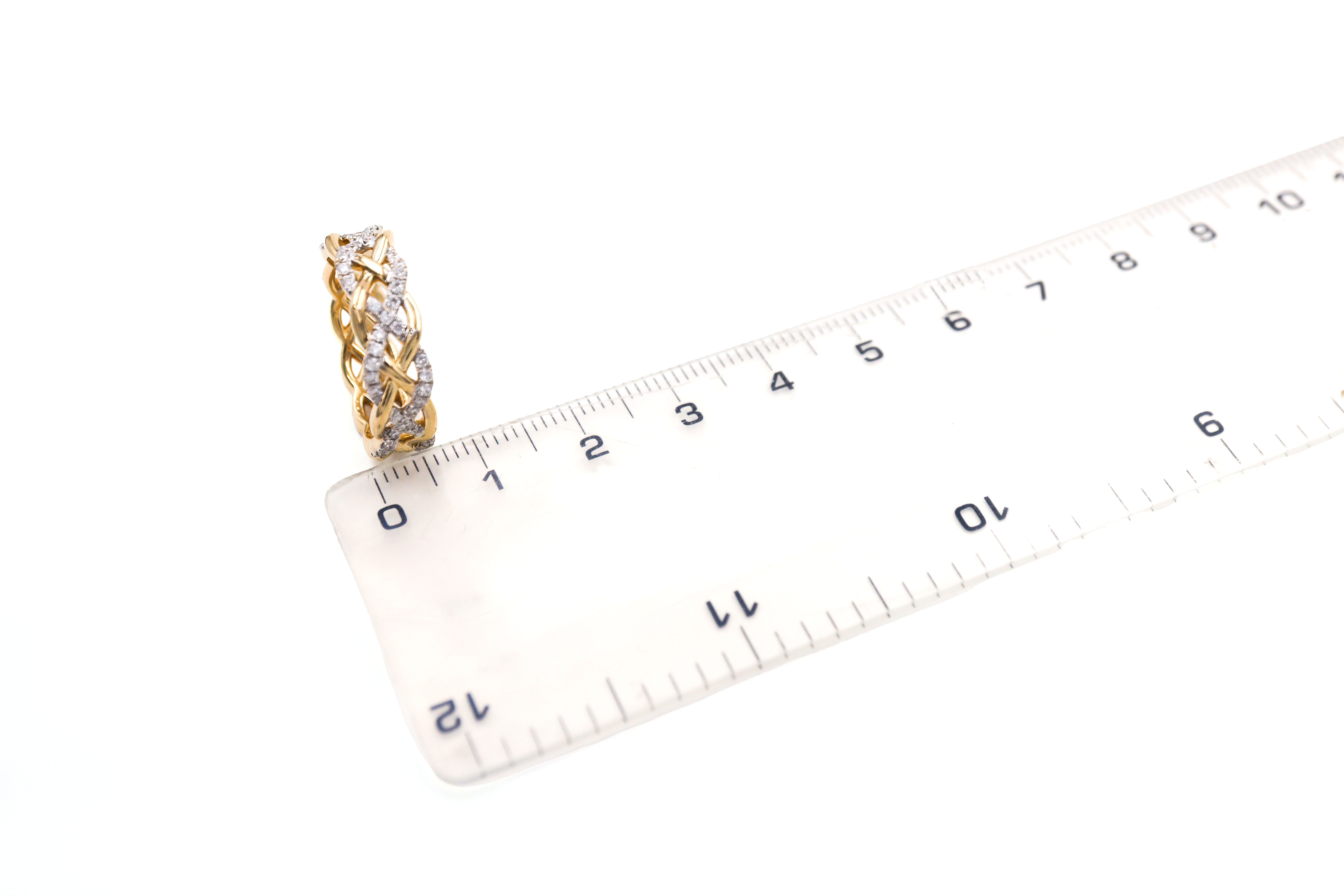 Irish 14K Yellow Gold Celtic Knot 5.0mm Ring With a Polished Finish For Women. Picture For Scale.