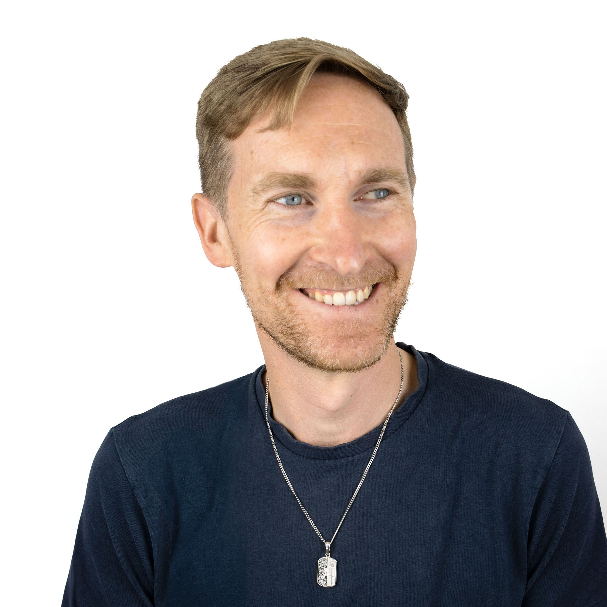 Striking Sterling Silver Trinity Knot Customizable Necklace With a Oxidized Finish For Men - Model Photo