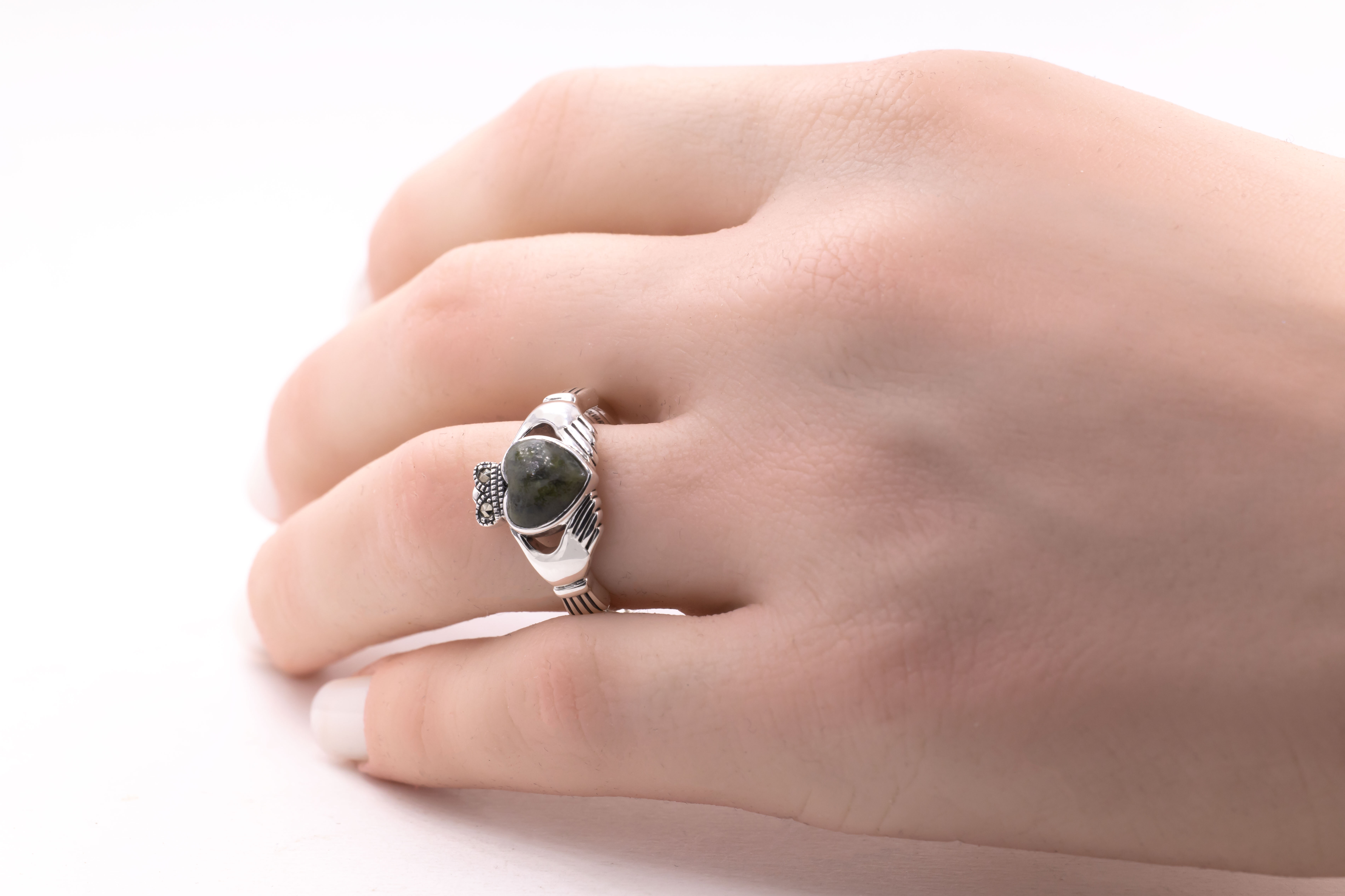 Attractive Sterling Silver Connemara Marble Ring With a Polished Finish For Women - Model Photo