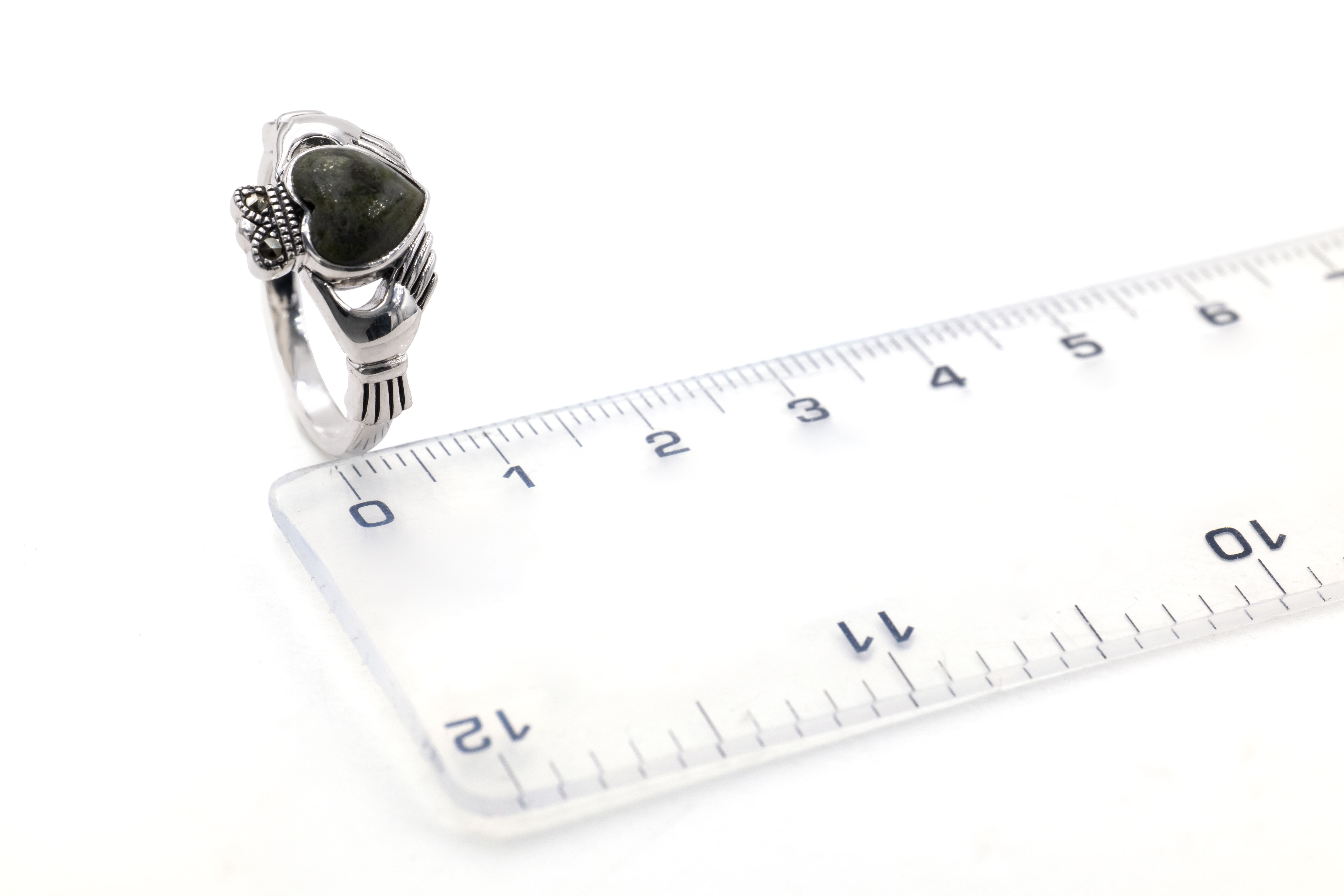 Real Sterling Silver Connemara Marble & Claddagh Ring With a Polished Finish For Women. Picture For Scale.