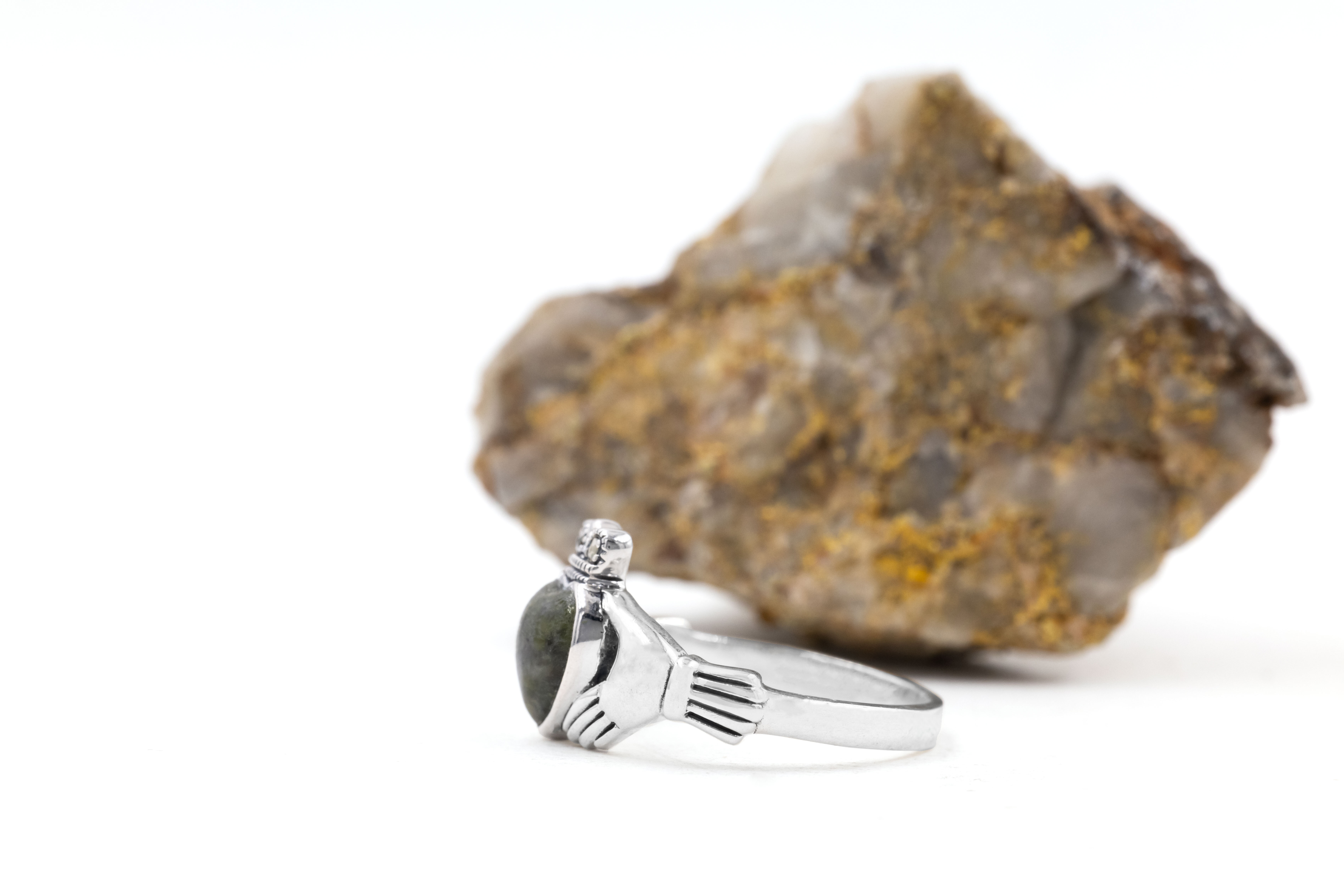 Womens Connemara Marble Ring in Sterling Silver With a Polished Finish. Side View.
