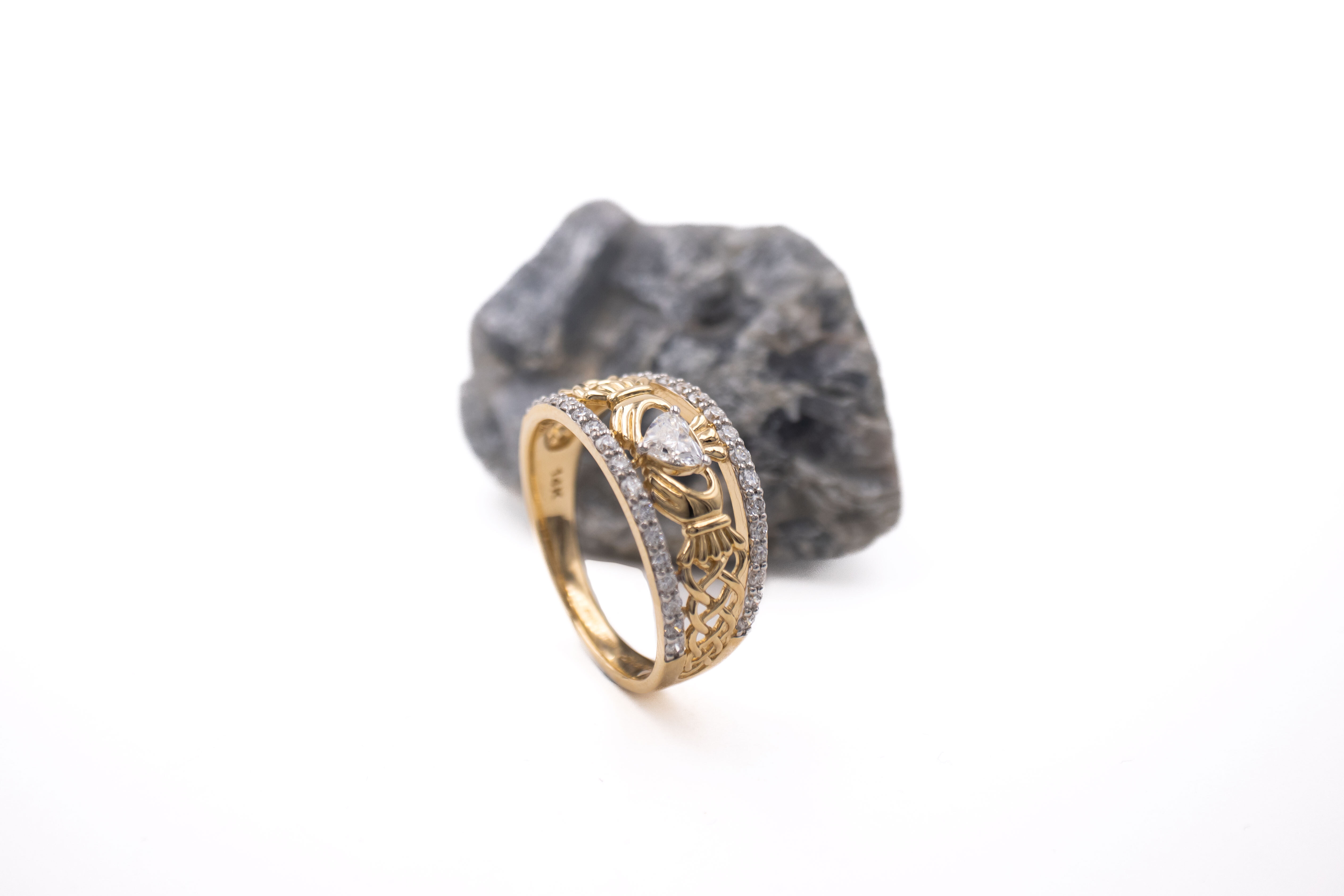 Irish Yellow Gold Claddagh Anniversary Ring With a Polished Finish For Women. Side View.