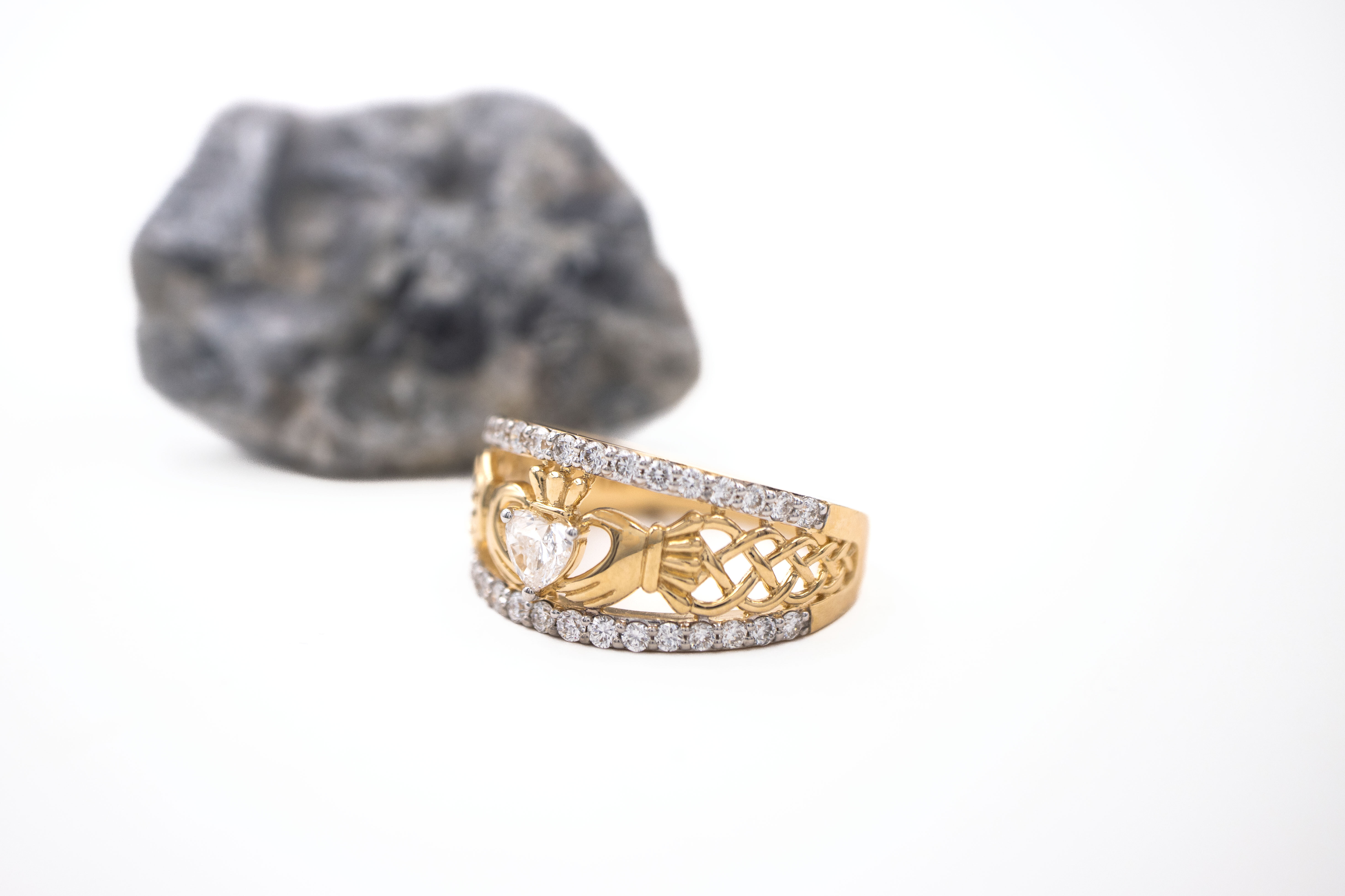 Genuine Yellow Gold Claddagh Anniversary Ring For Women With a Polished Finish. Side View.