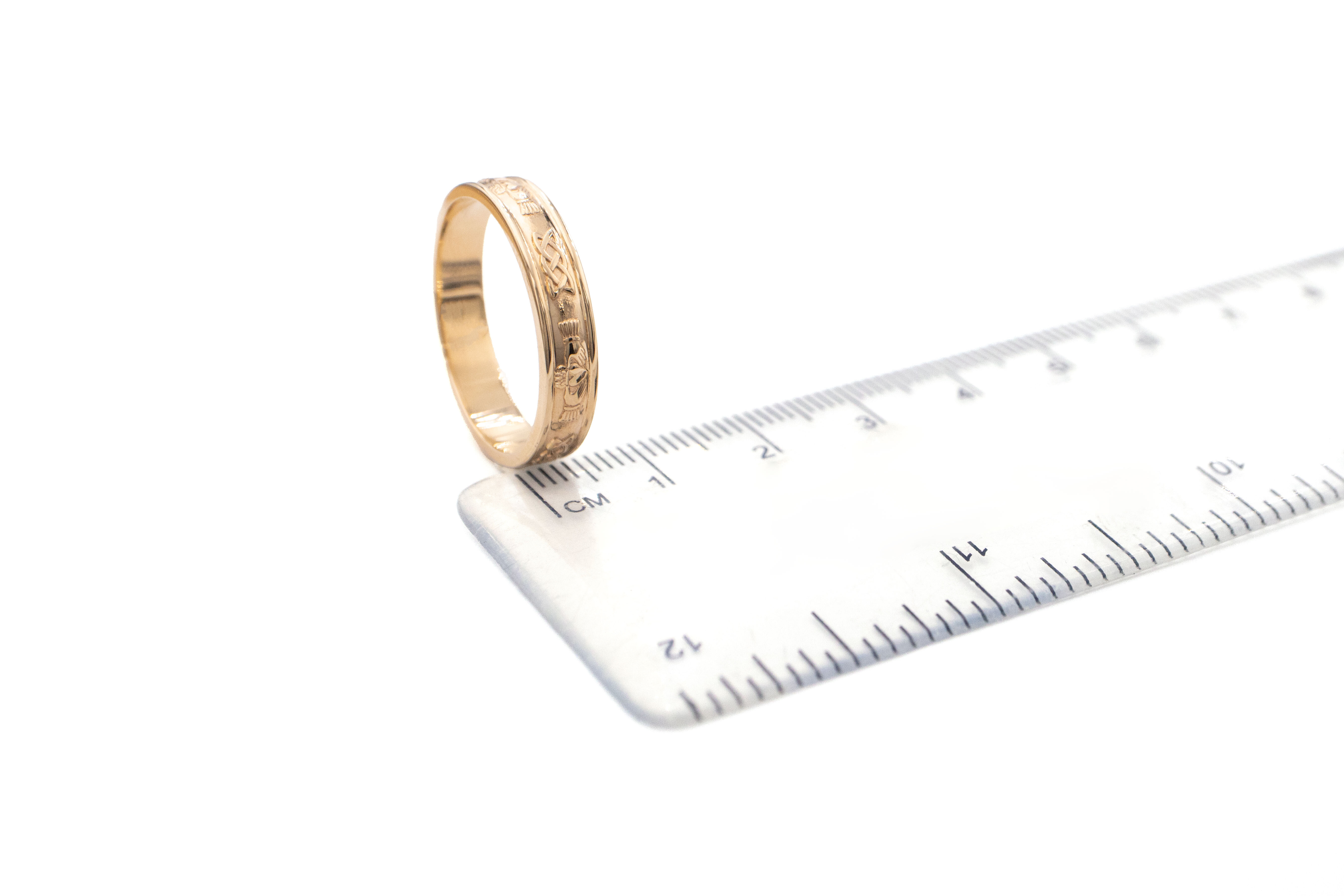 Authentic Yellow Gold Claddagh & Celtic Knot Gift Set With a Polished Finish. Picture For Scale.