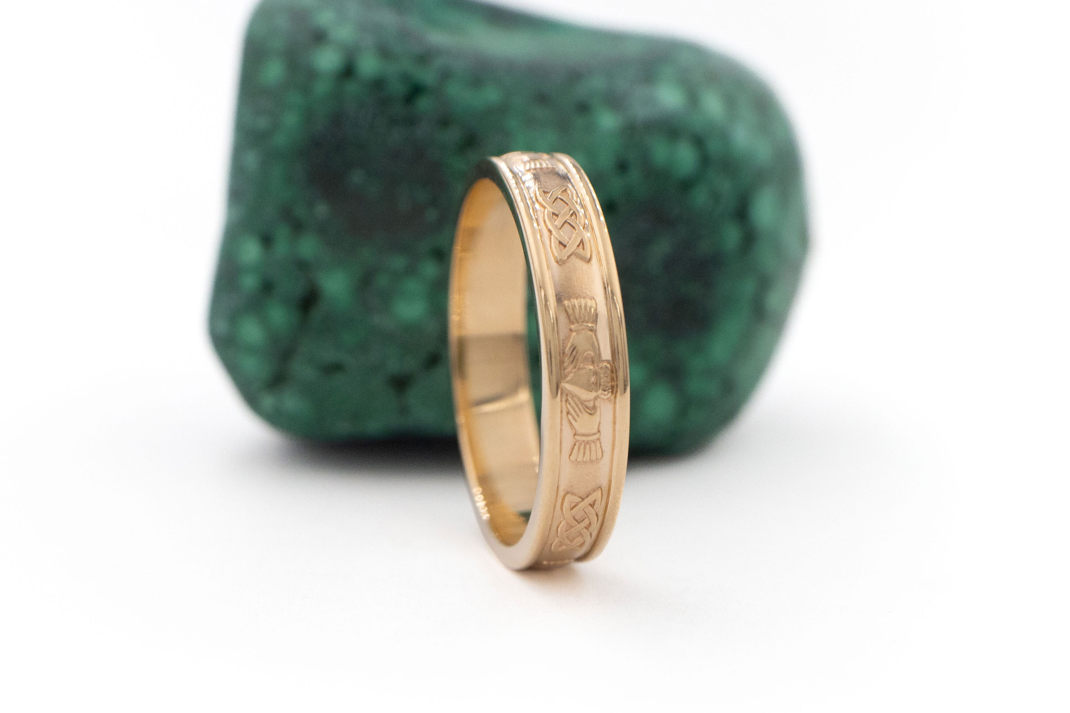 Irish Yellow Gold Claddagh Wedding Ring With a Polished Finish For Women. Side View.