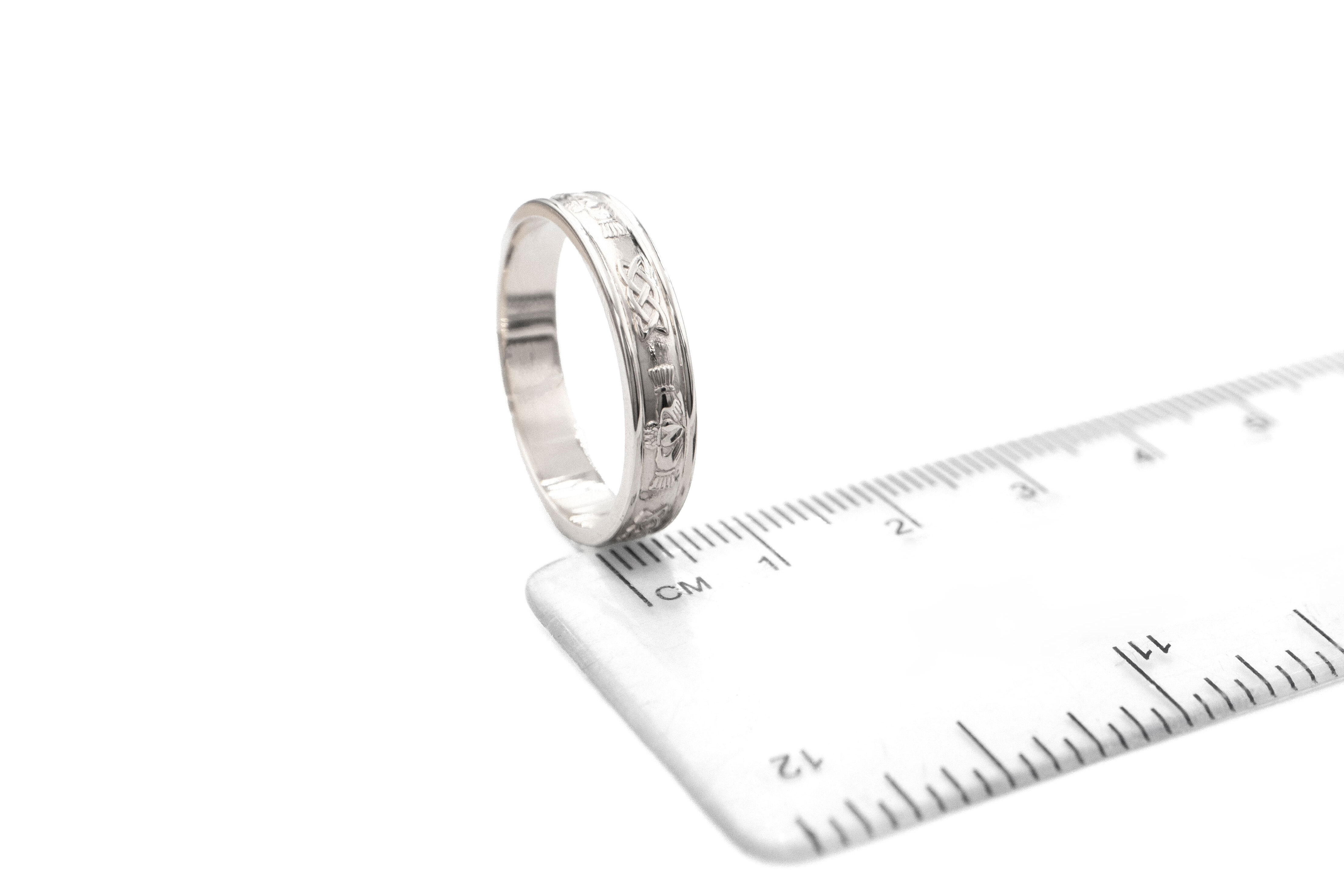Womens Claddagh 6.7mm Ring in 18K White Gold With a Polished Finish. Picture For Scale.