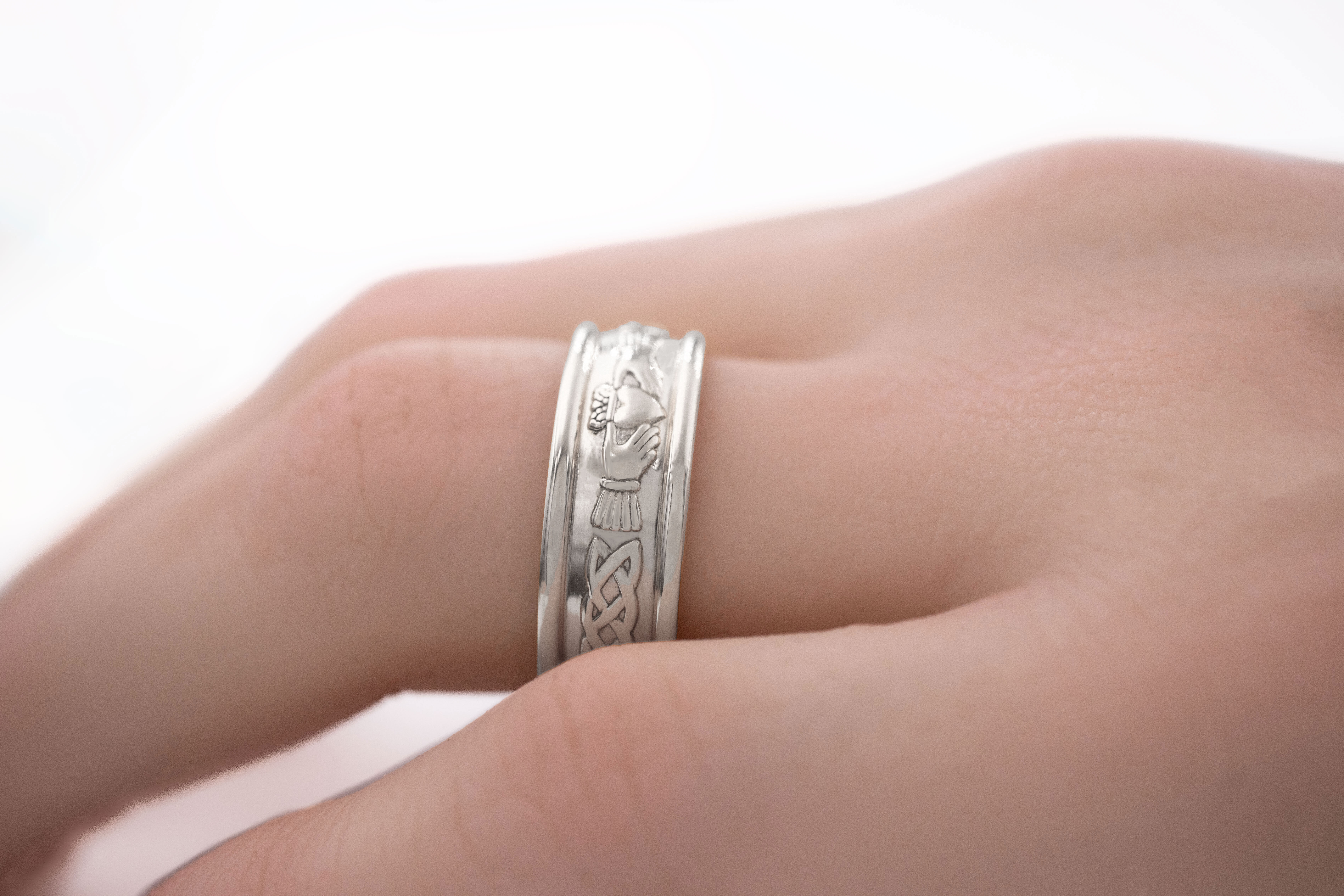 Gorgeous White Gold Claddagh & Celtic Knot 5.0mm Ring For Men With a Polished Finish - Model Photo