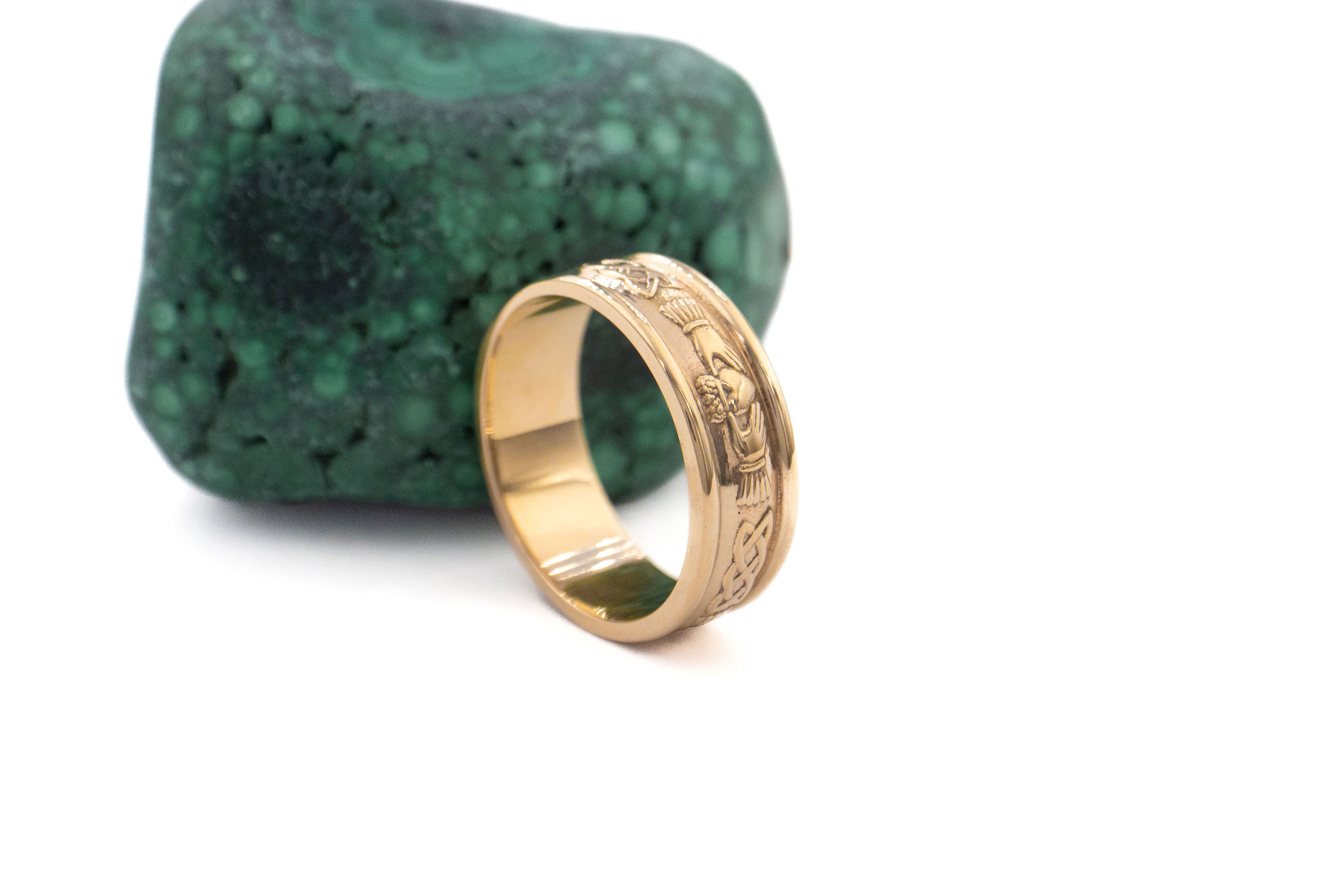 Mens Polished Claddagh 5.0mm Ring in Real Yellow Gold. Side View.