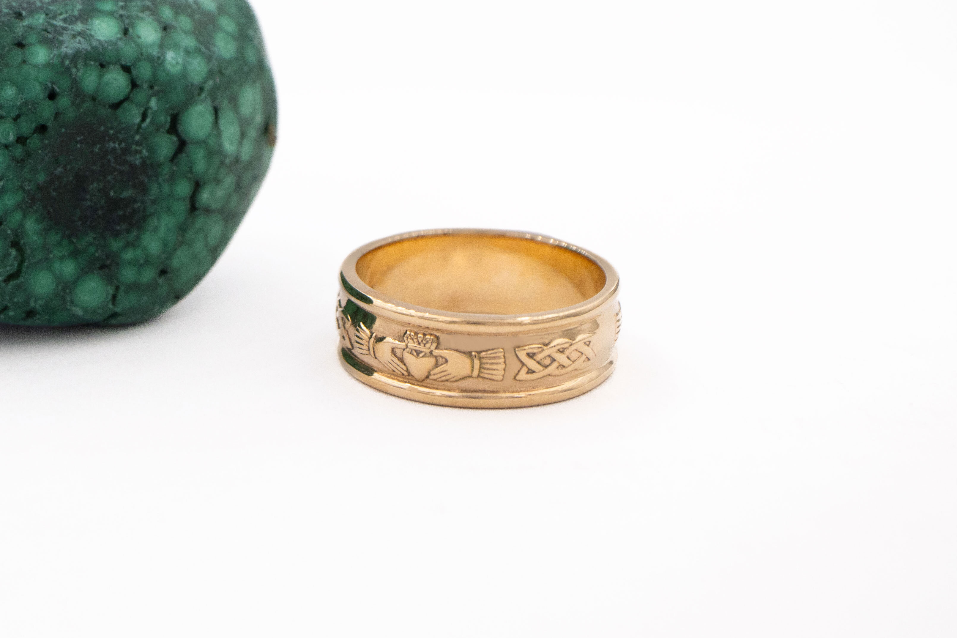 Mens Striking Polished Yellow Gold Claddagh & Celtic Knot Wedding Ring. Side View.