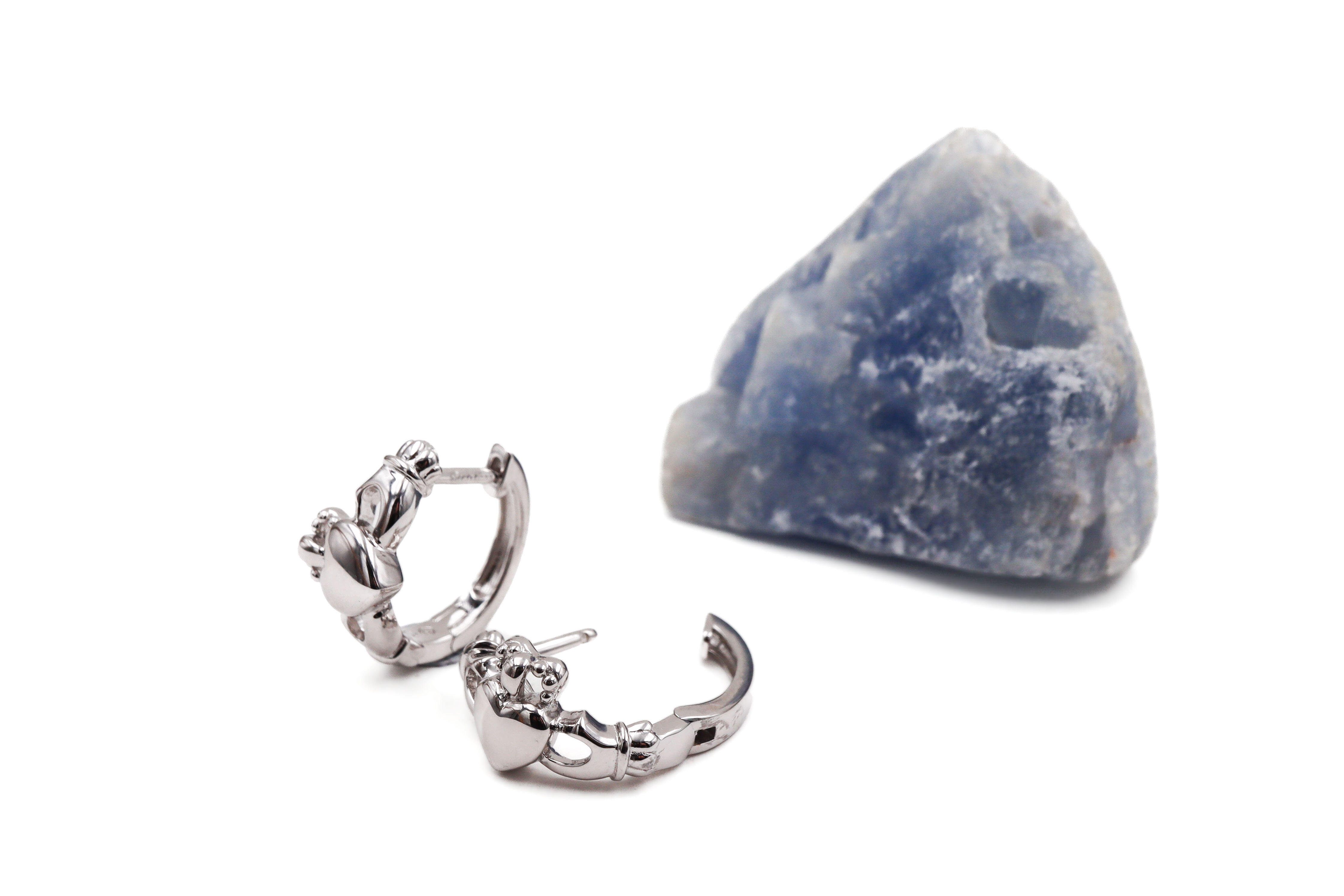 Authentic Sterling Silver Claddagh Earrings For Women With a Polished Finish. Photographed Open.