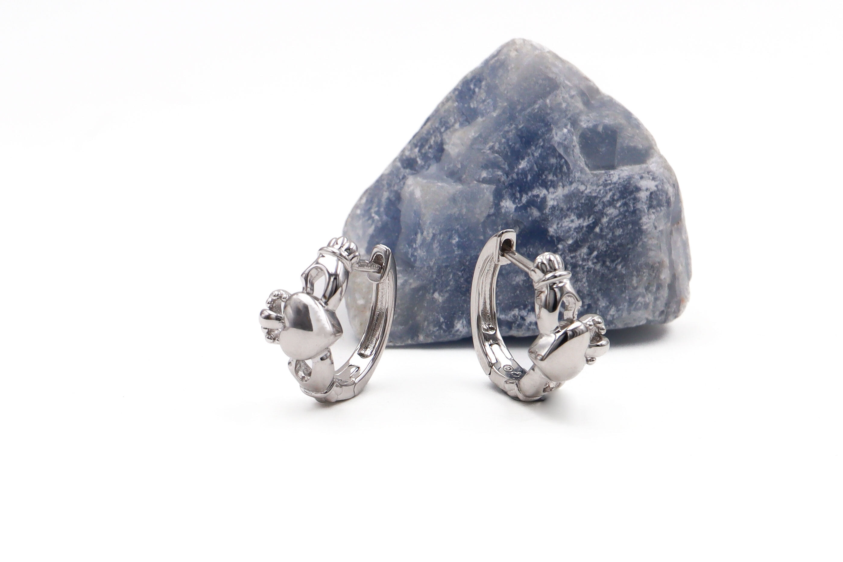 Genuine Sterling Silver Claddagh Earrings For Women With a Polished Finish. Side View.