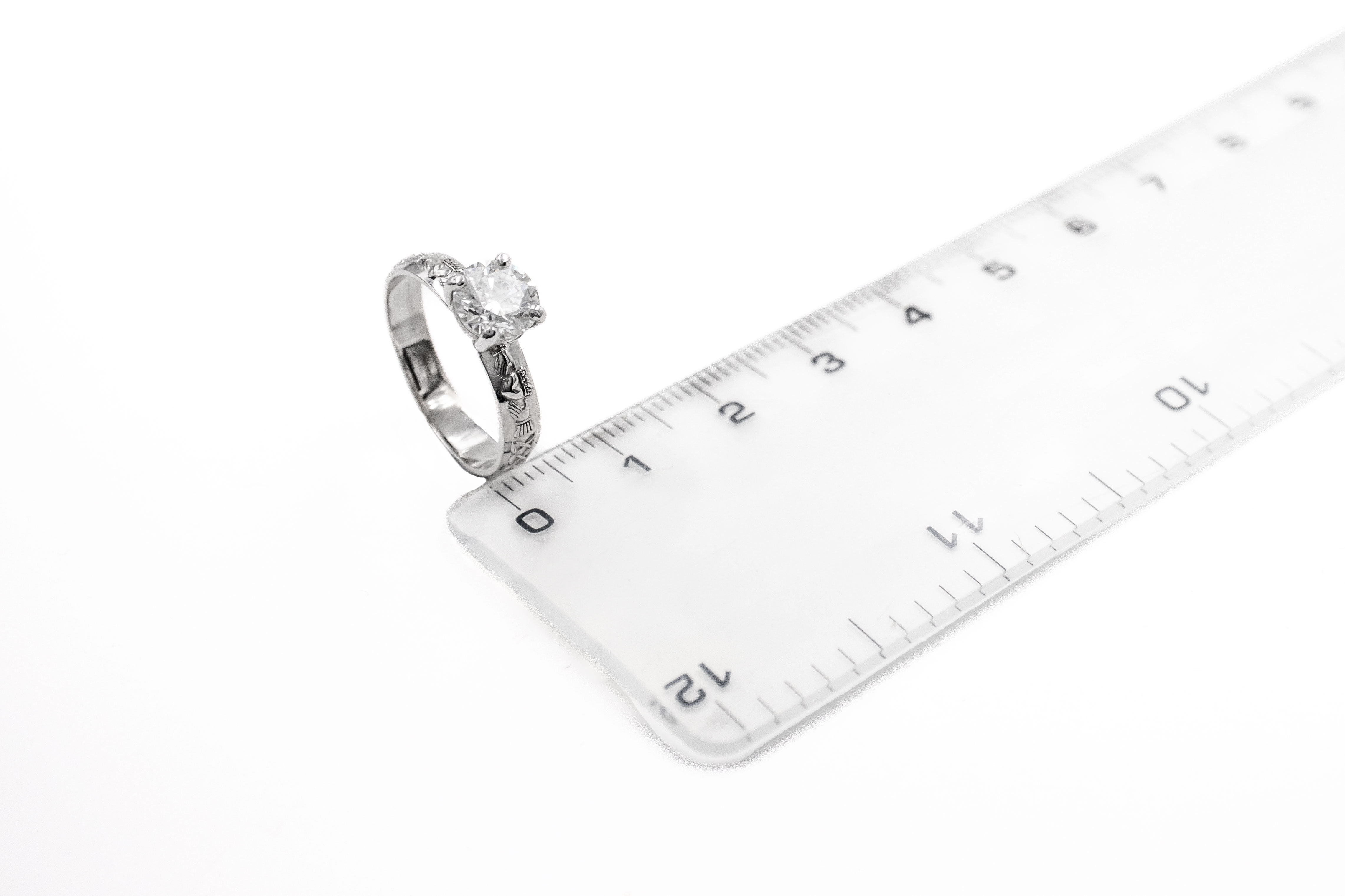 Womens Claddagh Ring in White Gold With a Polished Finish. Picture For Scale.