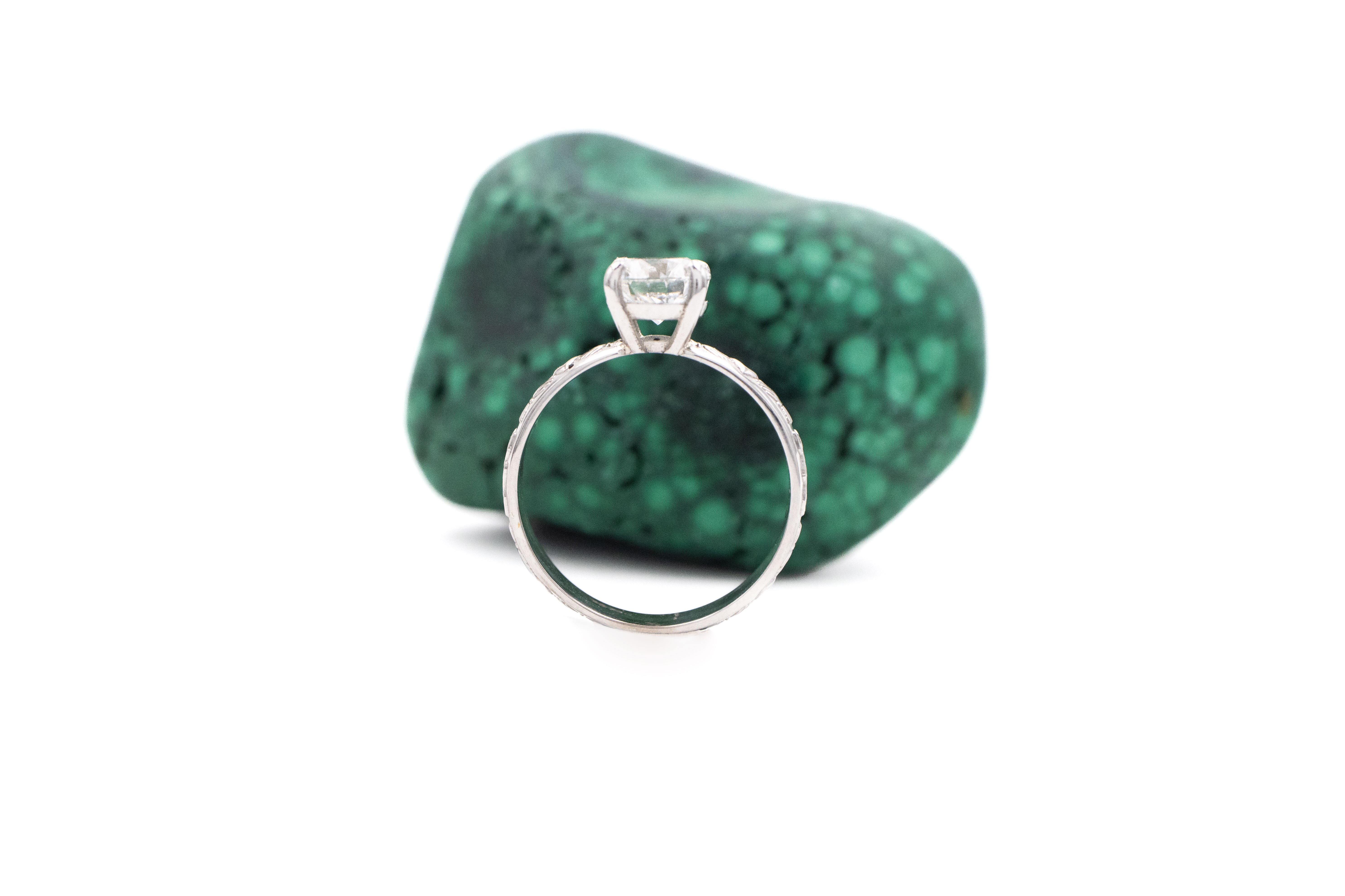 Romantic White Gold Claddagh Ring For Women With a Polished Finish. Side View.