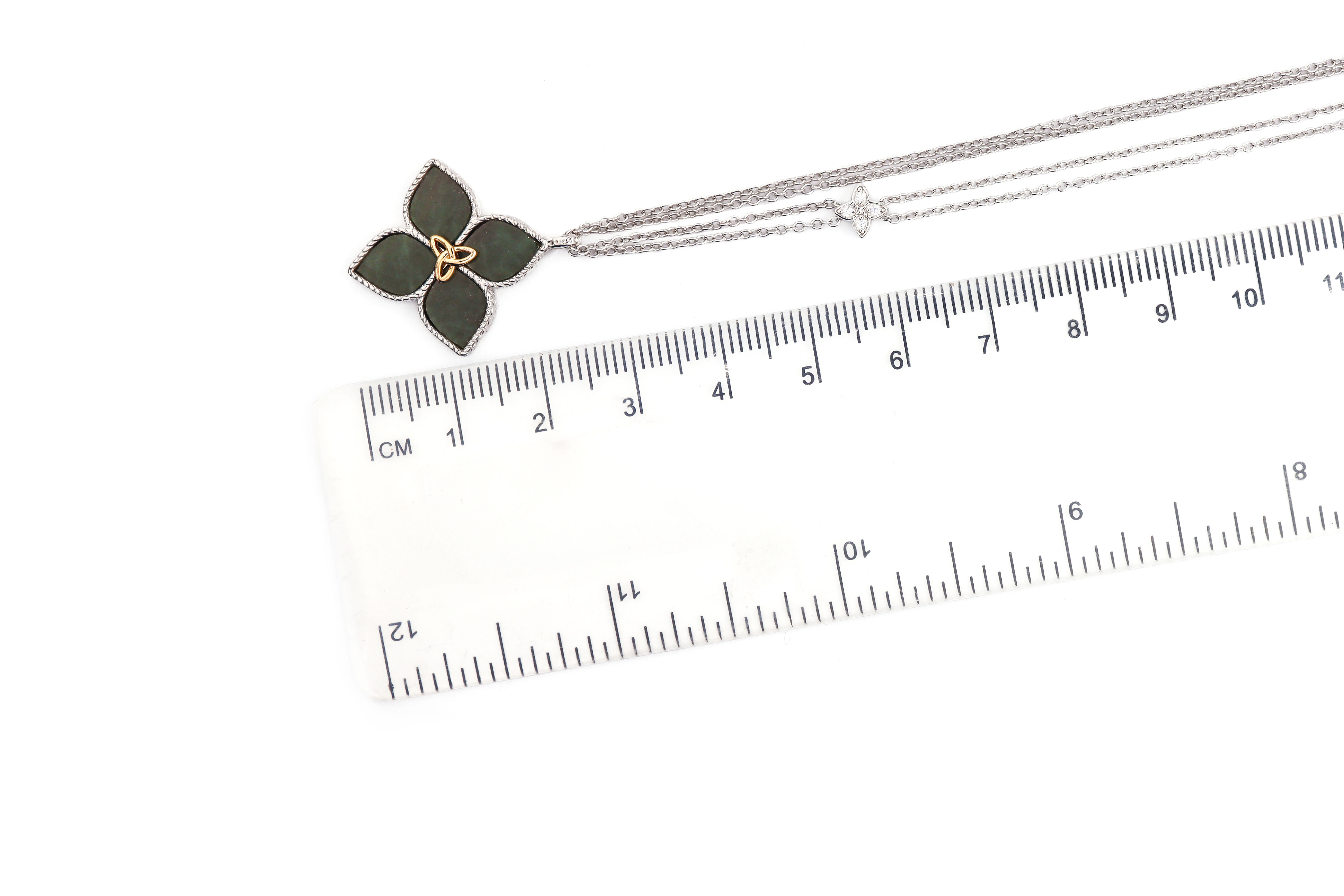 Irish Sterling Silver Connemara Marble Necklace For Women With a Polished Finish. Picture For Scale.