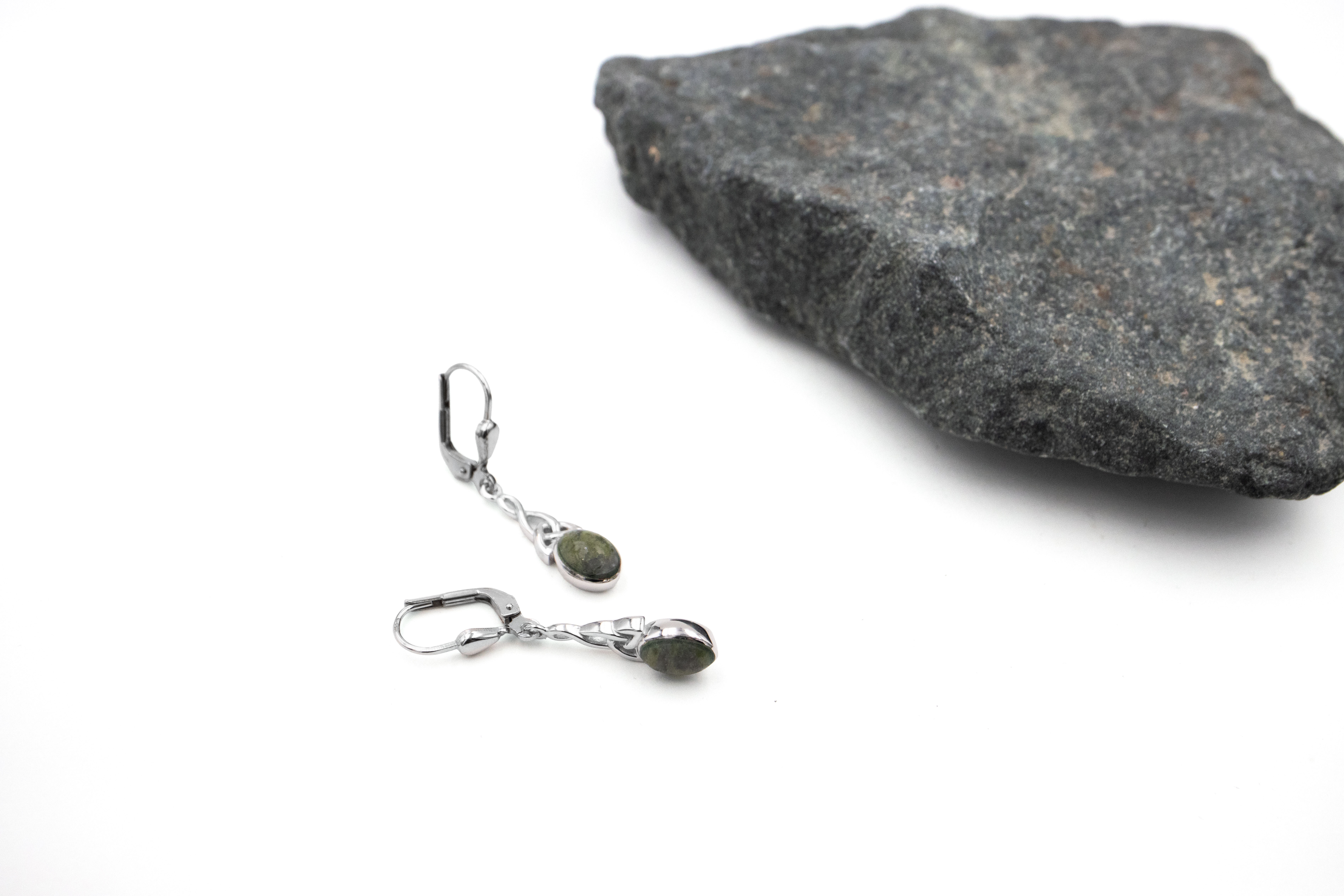 Gorgeous Sterling Silver Trinity Knot Earrings With a Polished Finish For Women. Side View.