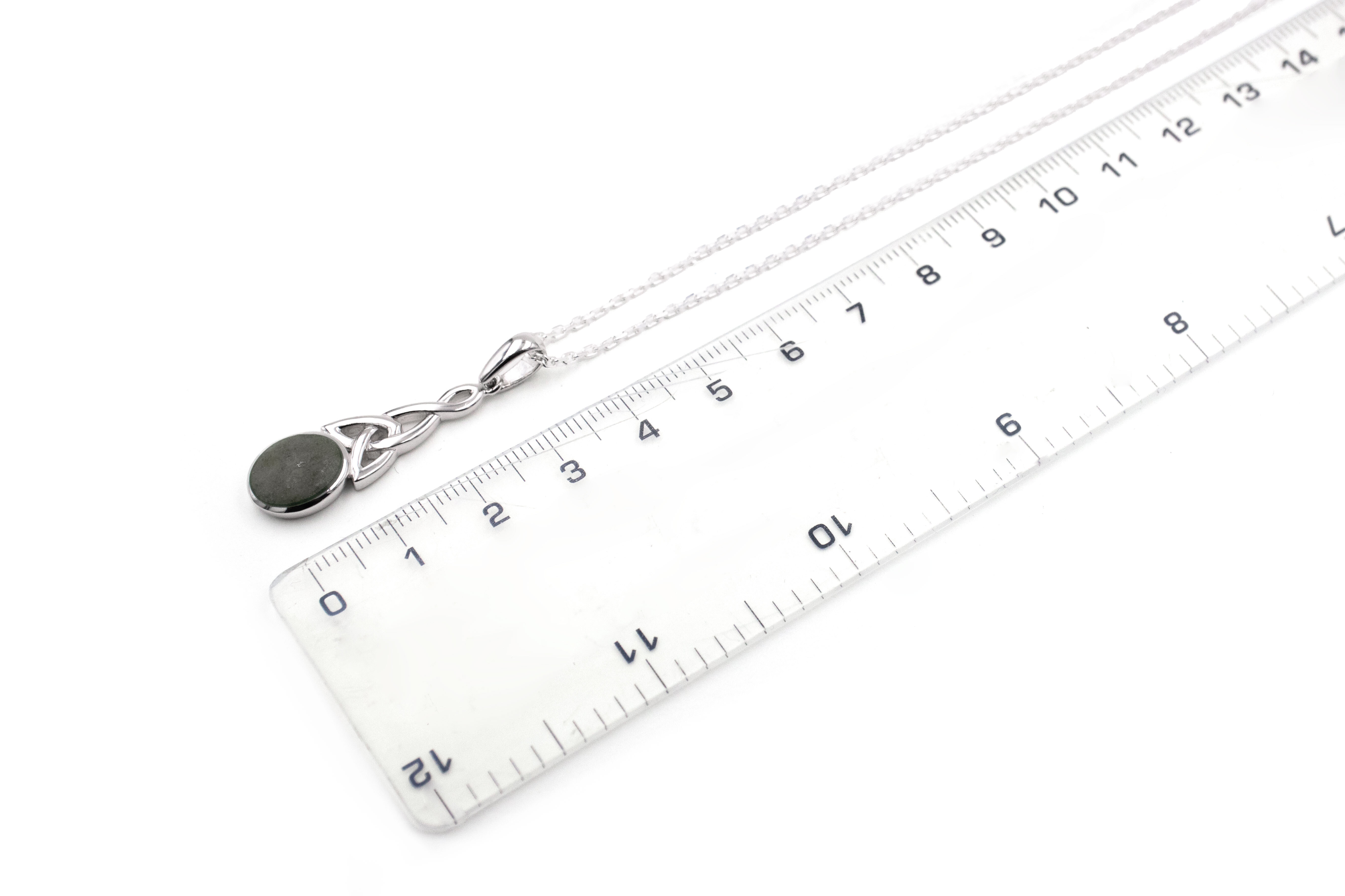 Irish Sterling Silver Trinity Knot & Connemara Marble Necklace For Women. Picture For Scale.