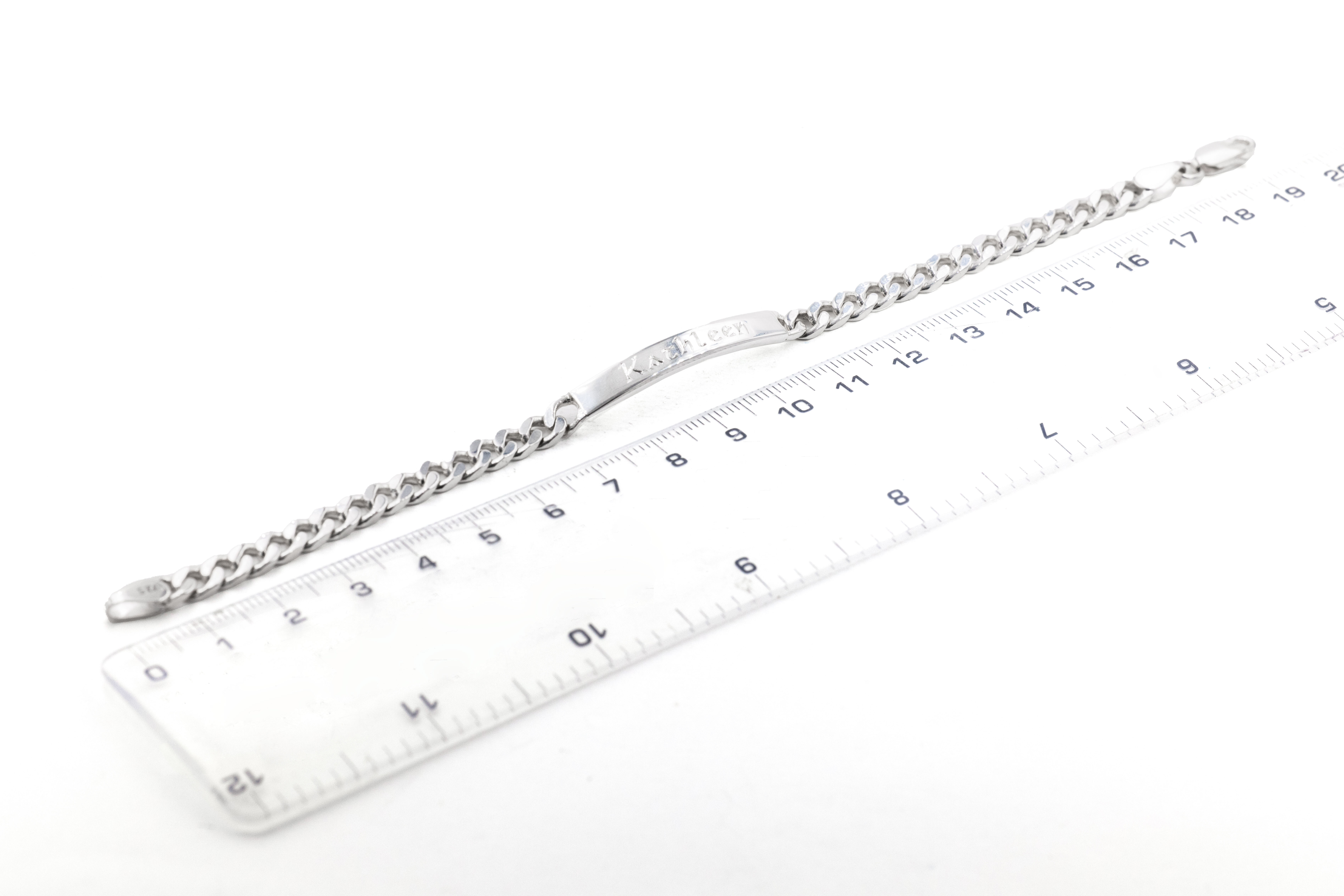 Gorgeous Sterling Silver Gaelic Bracelet For Women With a Polished Finish. Picture For Scale.