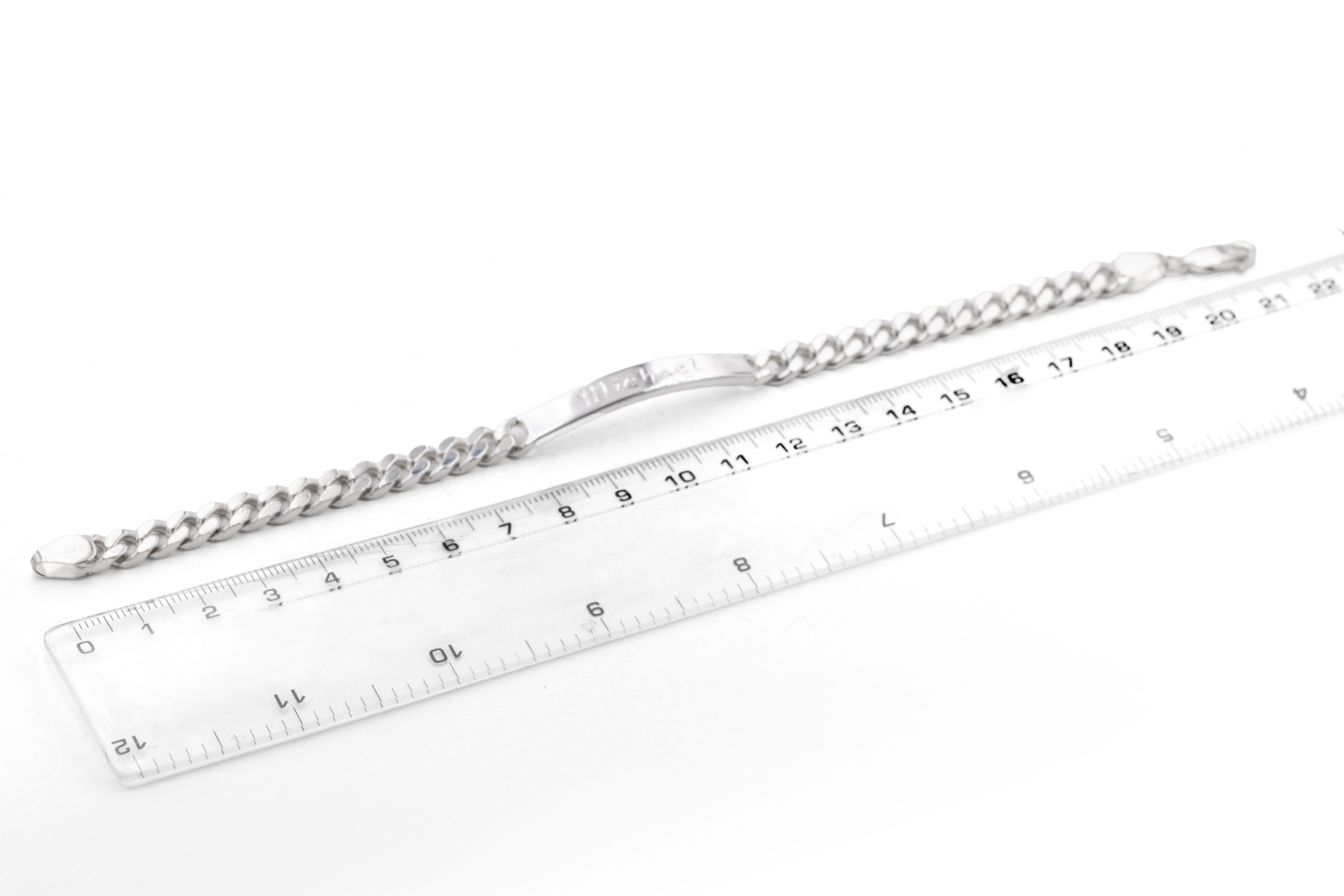 Mens Gaelic Bracelet in Sterling Silver With a Polished Finish. Picture For Scale.