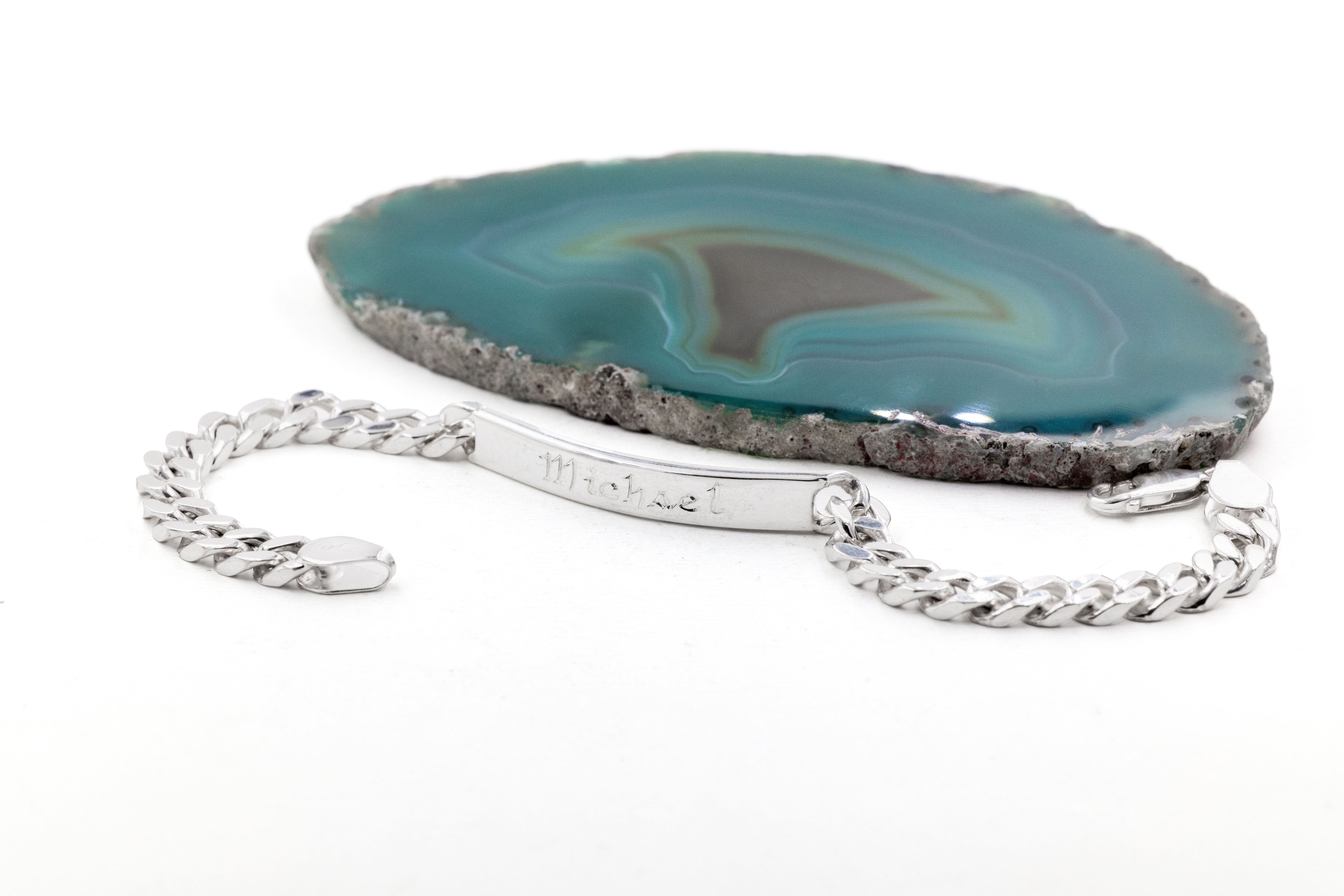 Attractive Sterling Silver Gaelic Bracelet For Men With a Polished Finish. Side View.