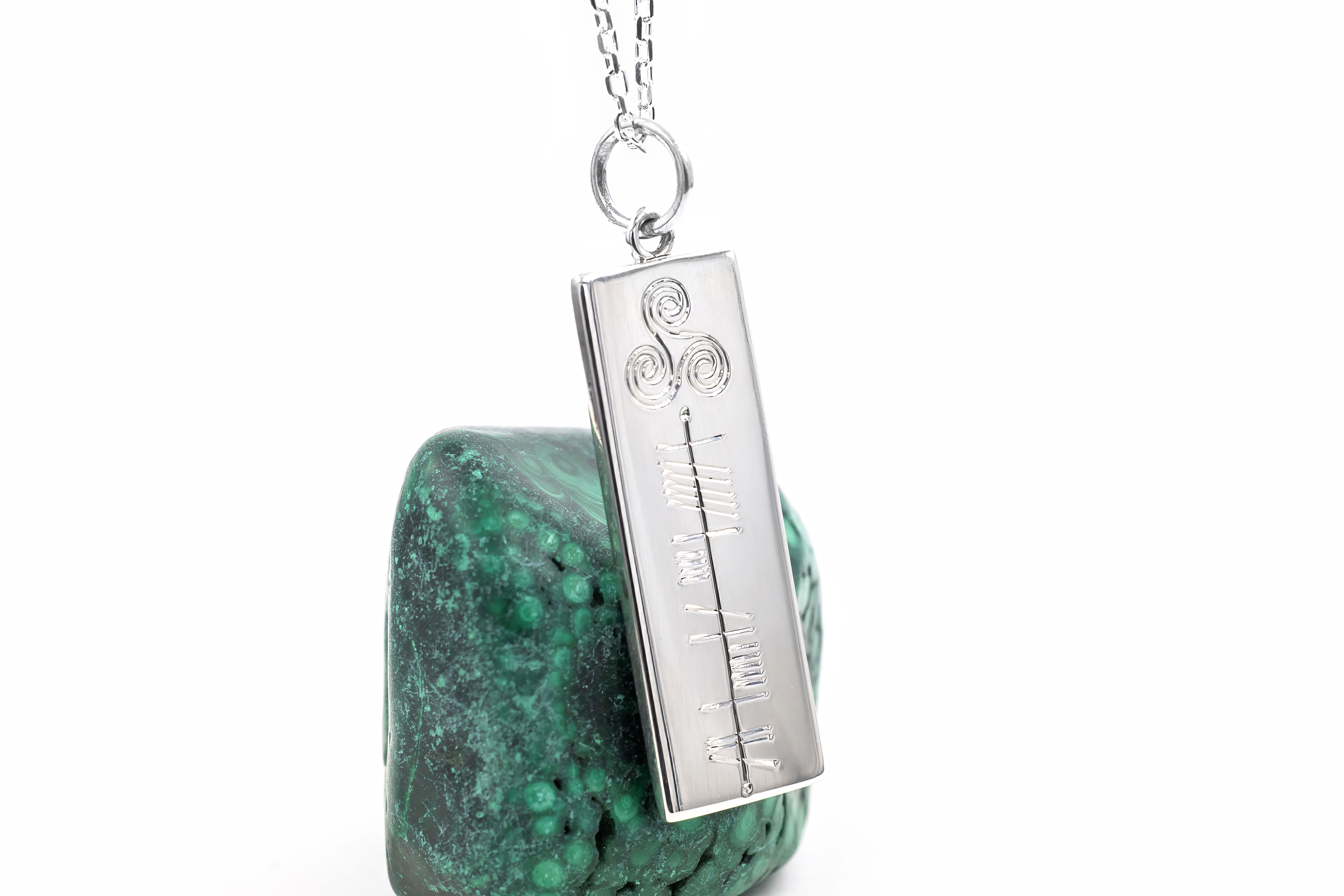 Ogham & Triskele Necklace in Sterling Silver With a Polished Finish