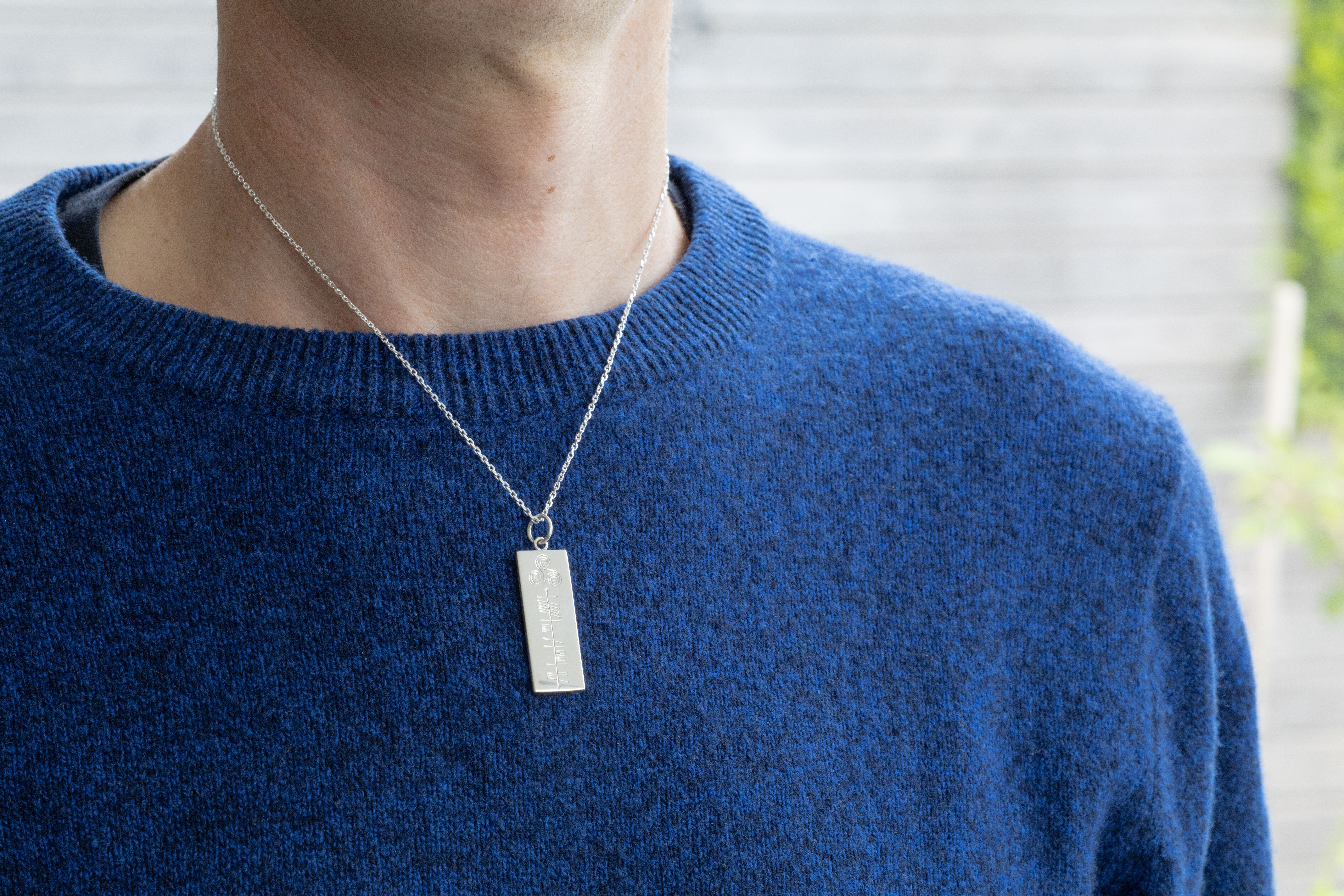 Customizable Sterling Silver Ogham Personalizable Necklace With a Polished Finish - Model Photo