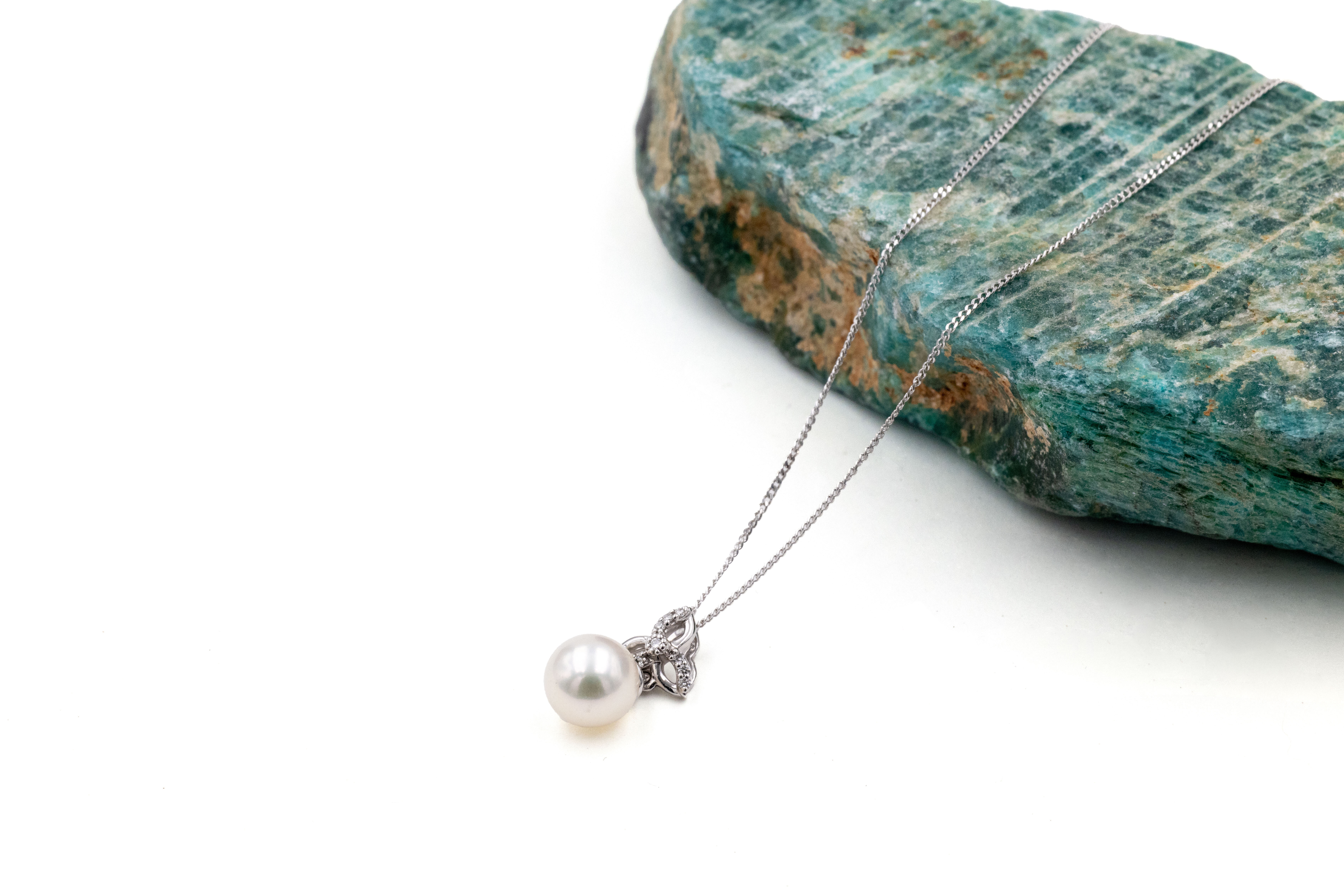 Genuine 9K White Gold Trinity Knot Necklace With a Polished Finish For Women