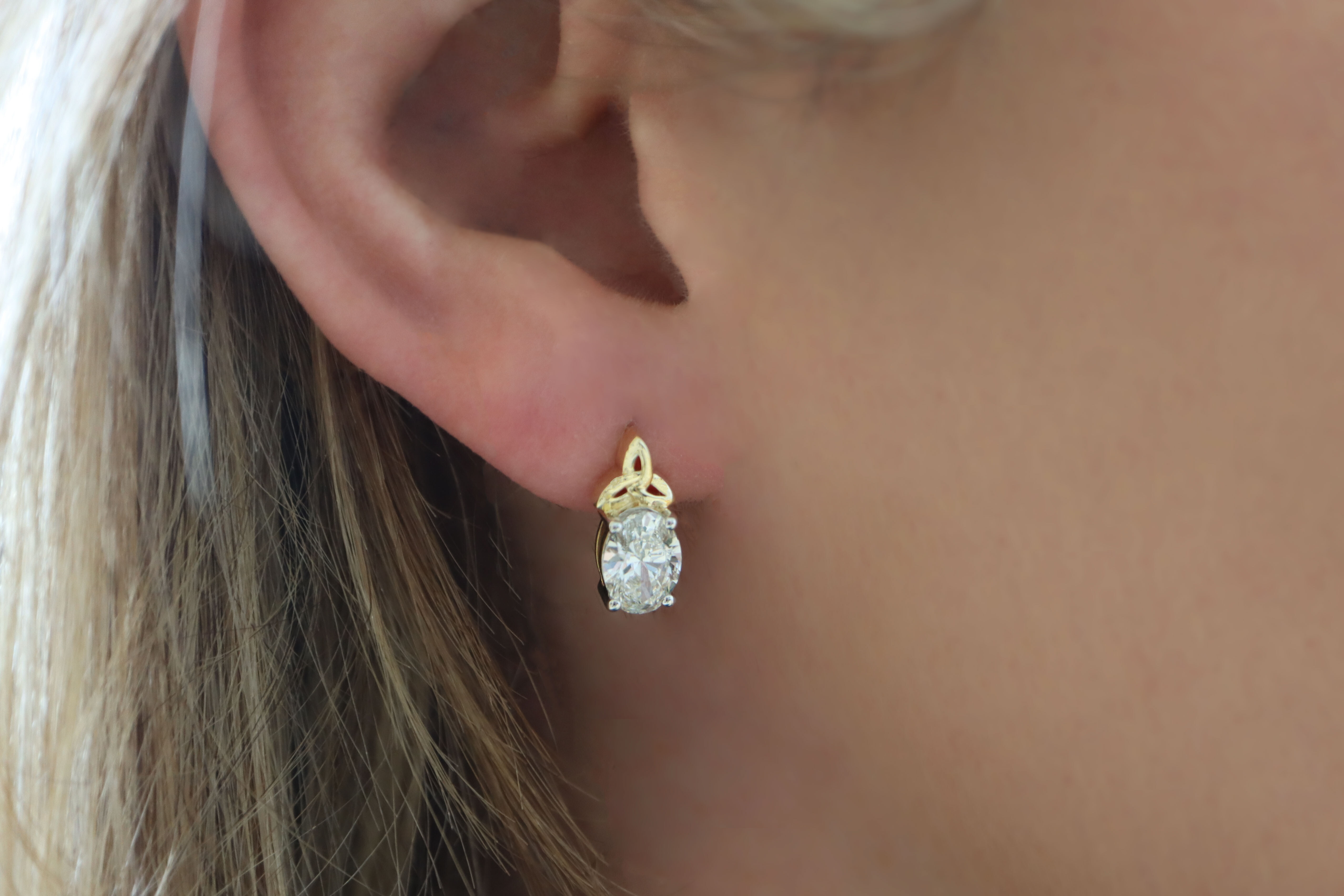 Womens 14K Yellow Gold Trinity Knot & Celtic Knot Earrings - Model Photo