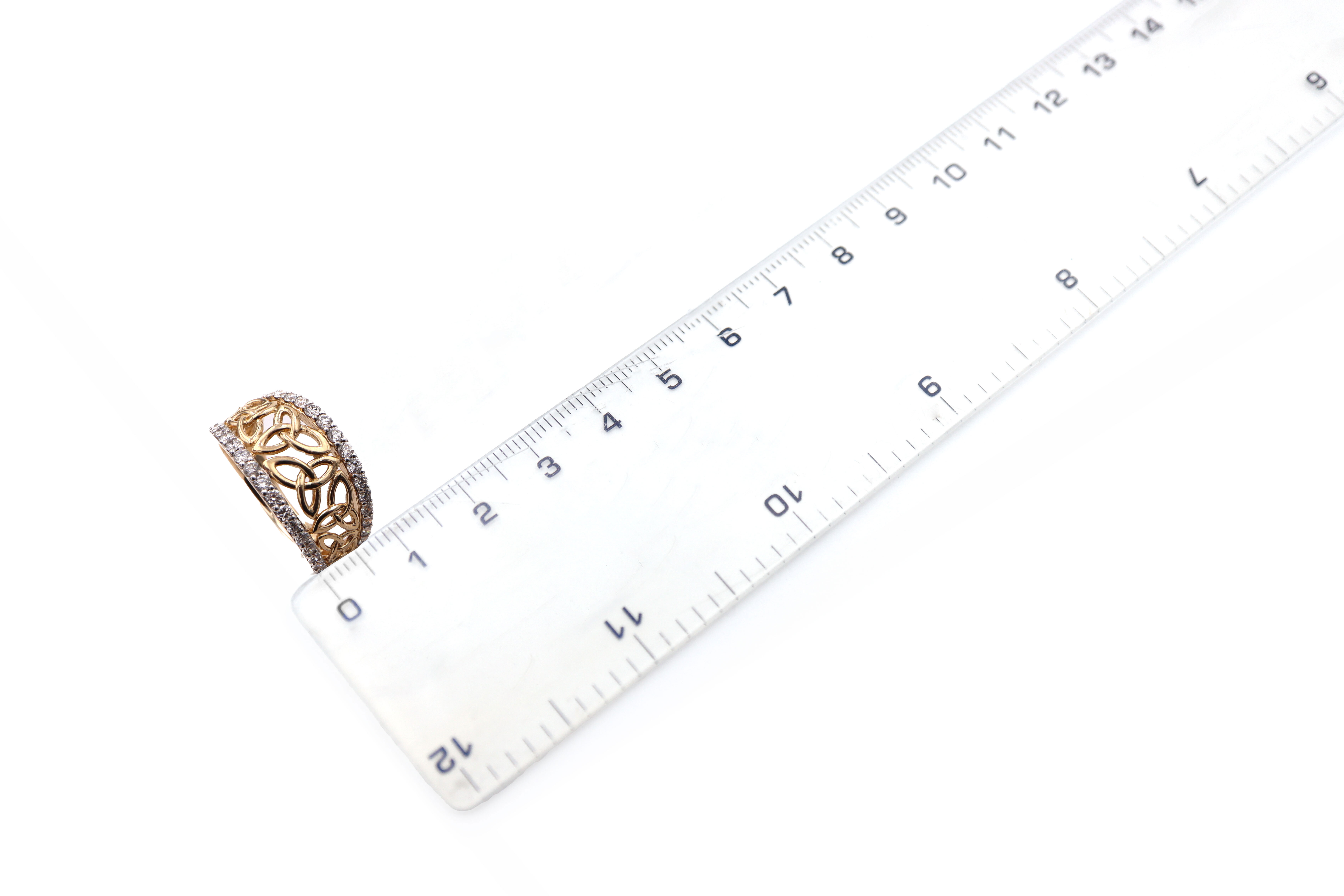 Womens Polished 14K Yellow Gold Trinity Knot Ring. Picture For Scale.