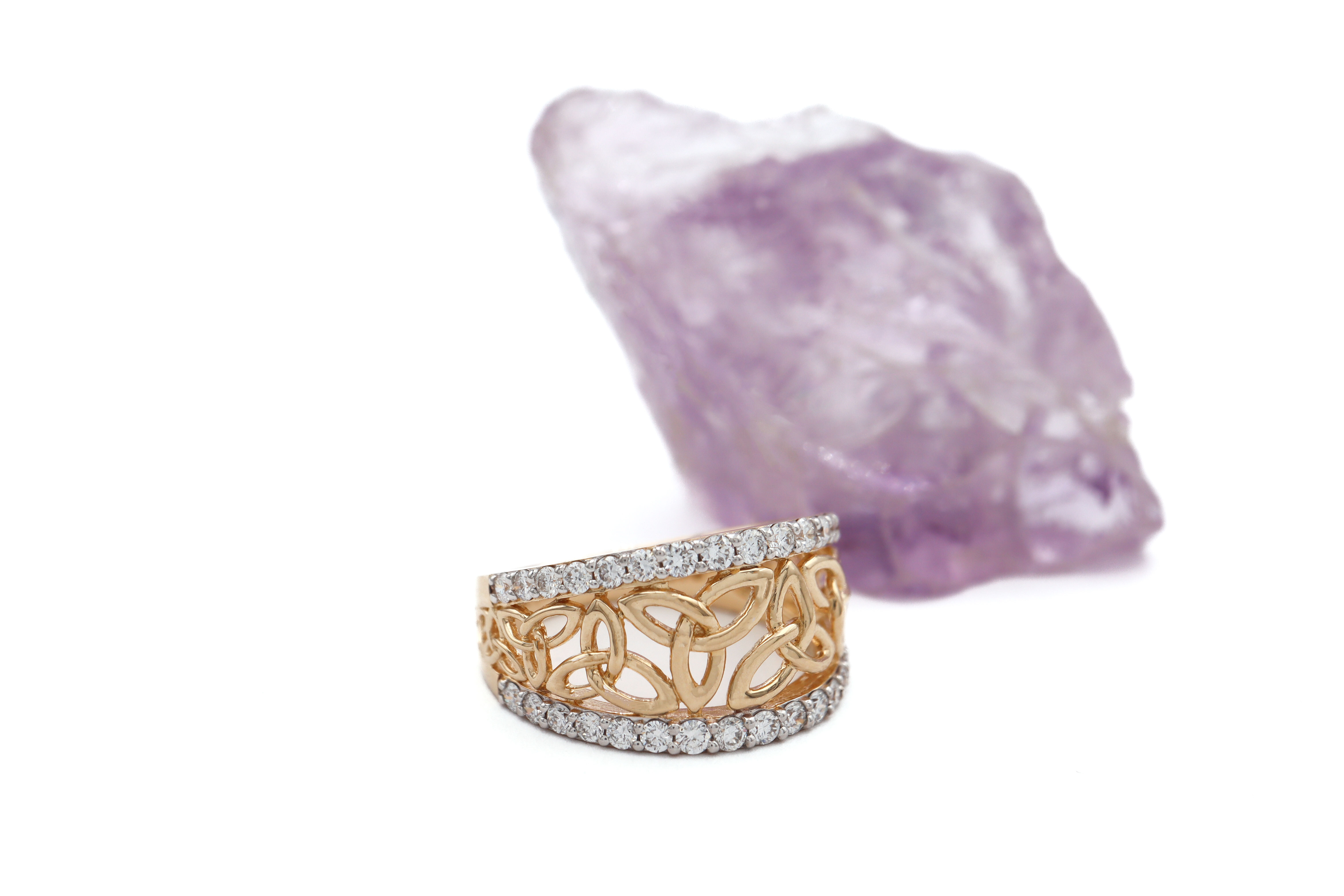 Luxurious Yellow Gold Trinity Knot Ring For Women With a Polished Finish. Side View.