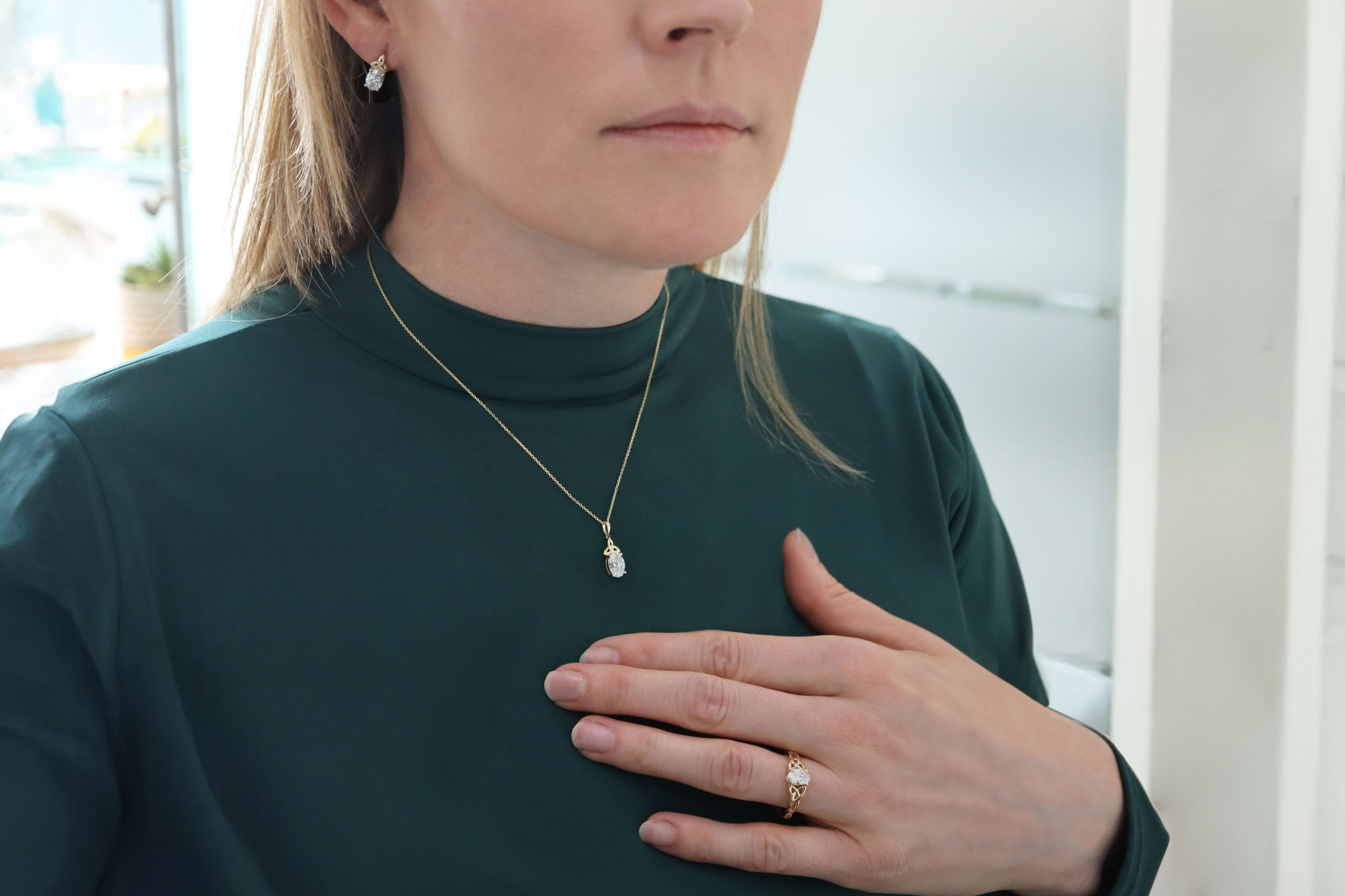 Attractive Yellow Gold Trinity Knot Gift Set For Women With a Polished Finish - Model Photo