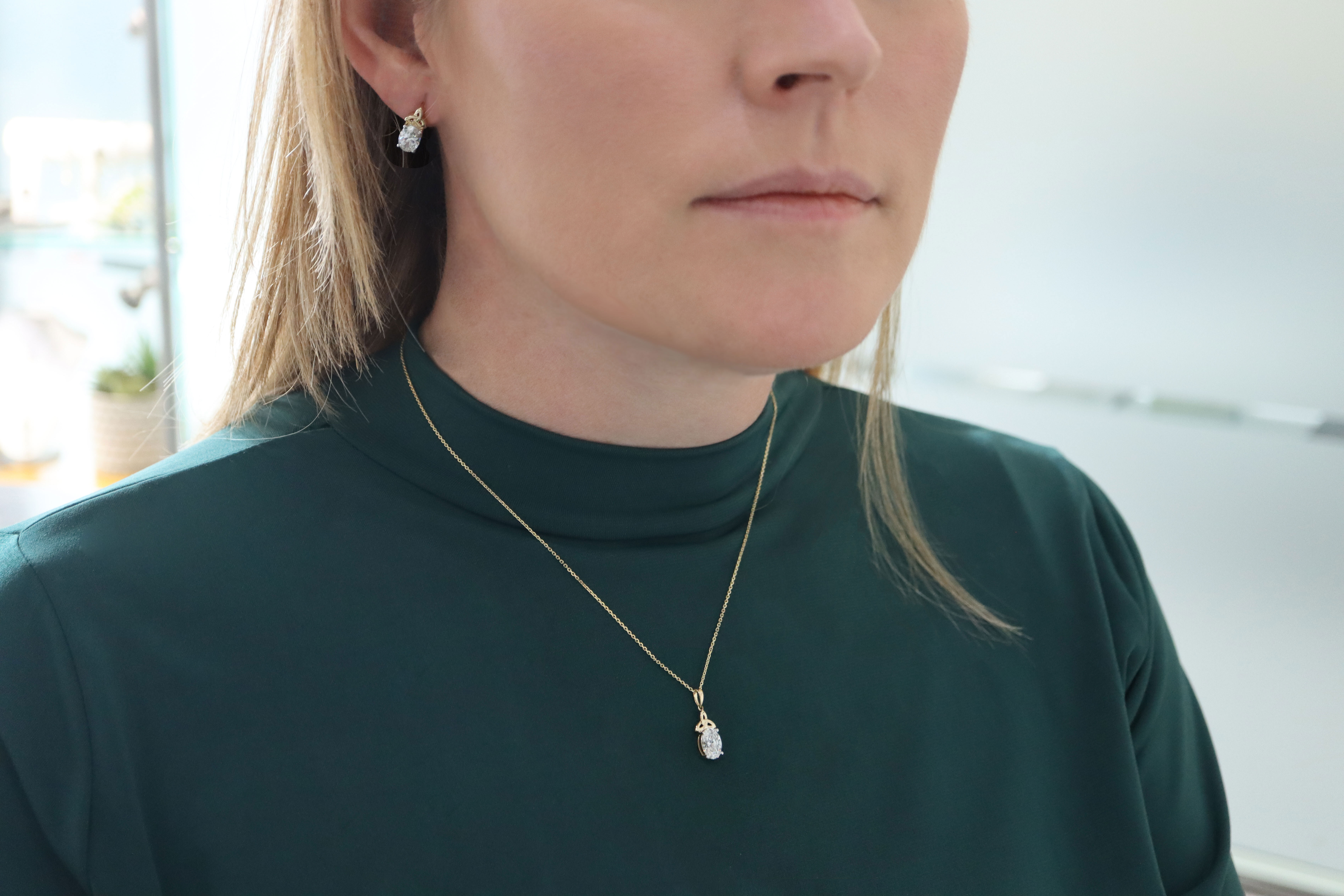 Genuine 14K Yellow Gold Trinity Knot & Celtic Knot Earrings For Women - Model Photo