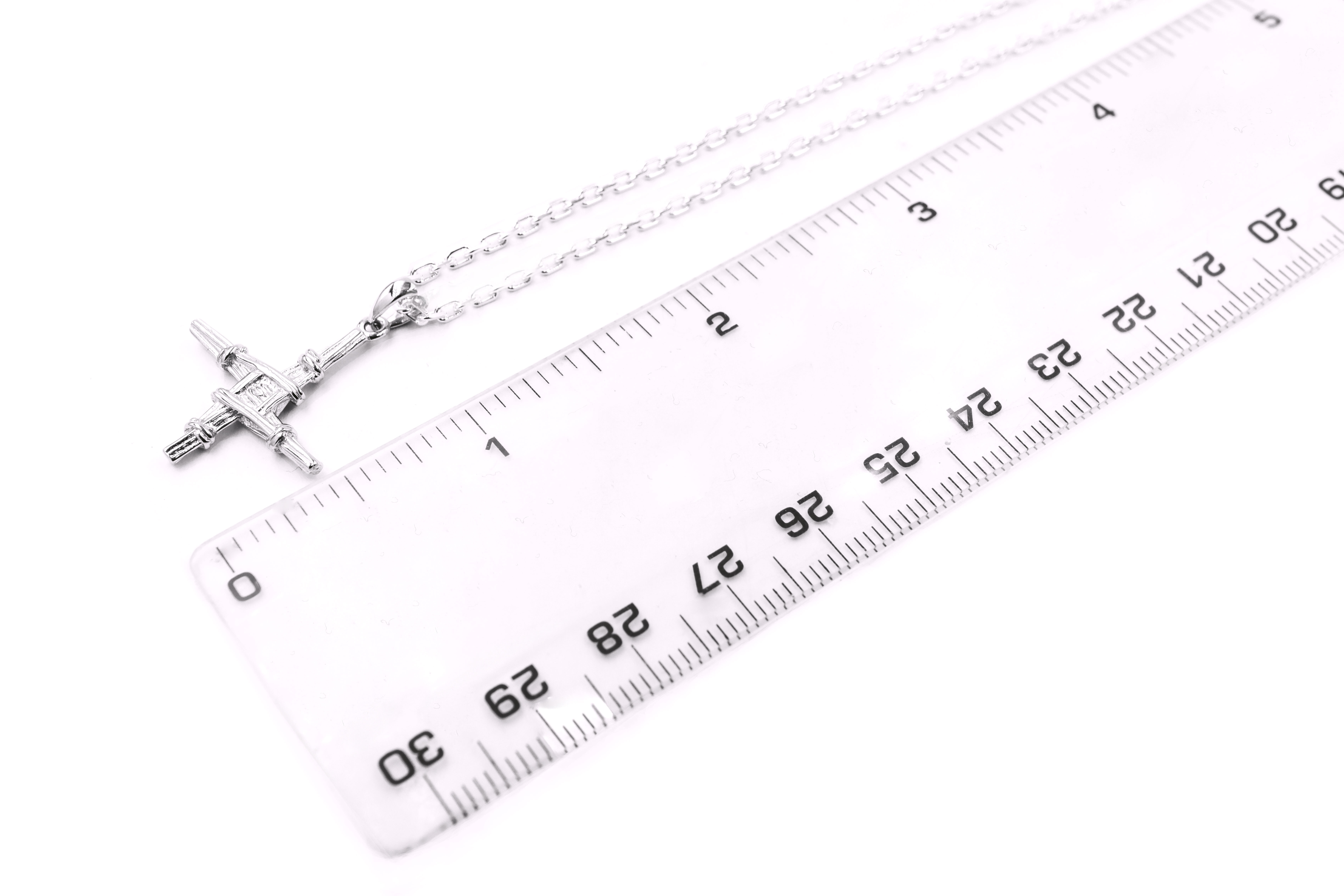 Small Attractive Sterling Silver St Brigids Cross Necklace For Women. Side View.
