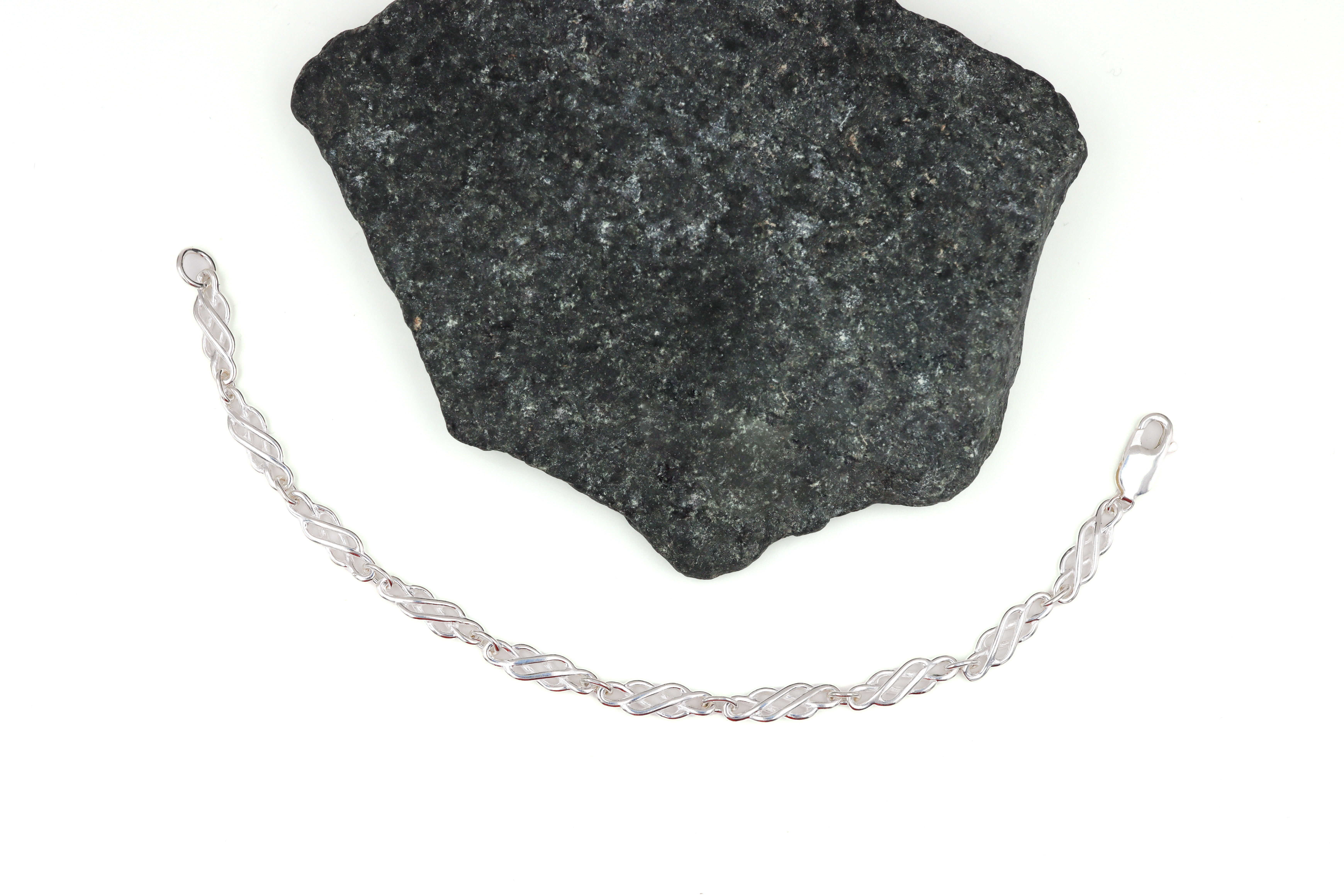 Attractive Sterling Silver Celtic Knot Bracelet For Women. Pictured Flat.