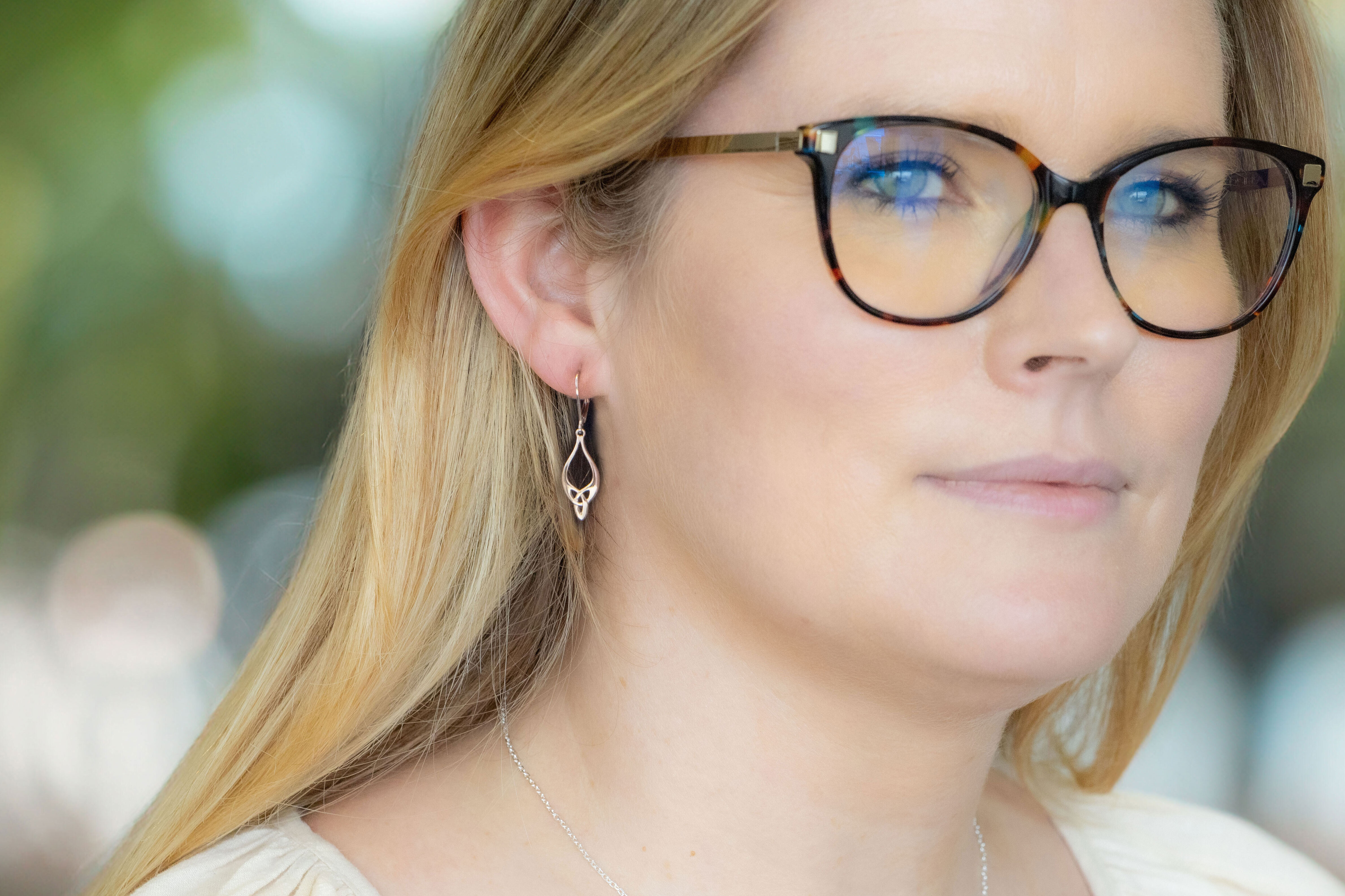 Womens Irish Polished Sterling Silver Trinity Knot Earrings - Model Photo