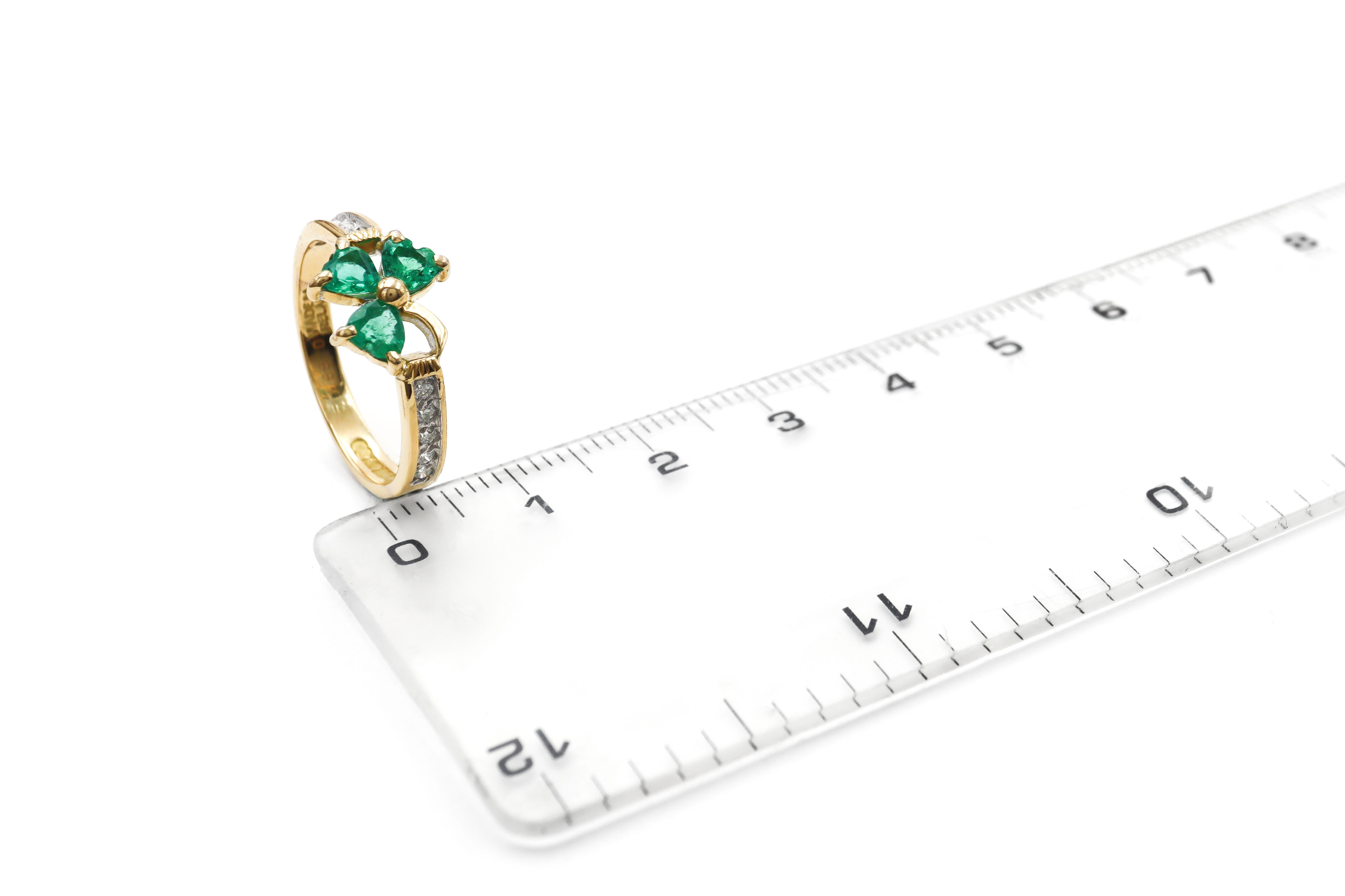 Genuine Yellow Gold Shamrock Anniversary Ring For Women With a Polished Finish. Picture For Scale.