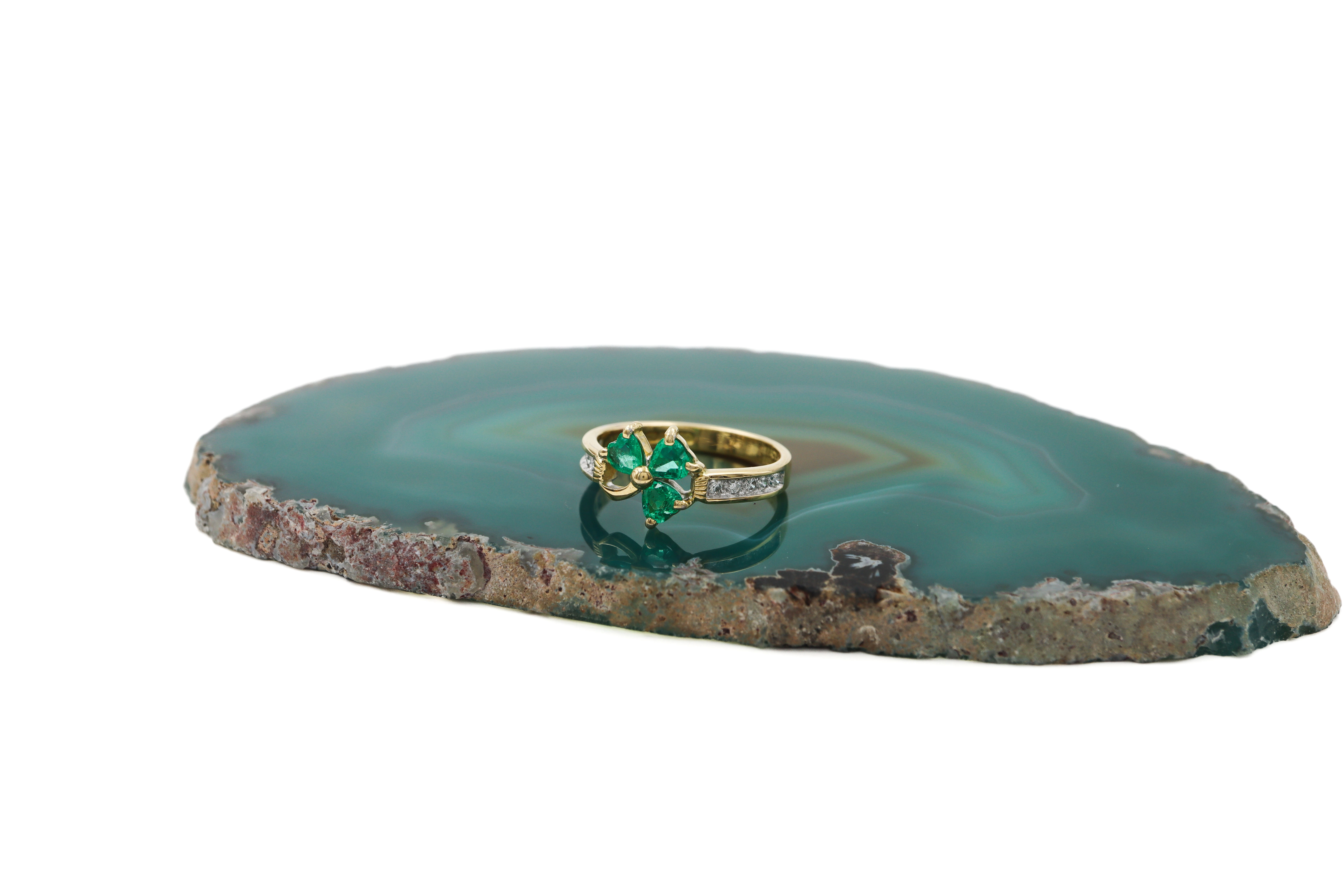 Luxurious Yellow Gold Shamrock Anniversary Ring For Women With a Polished Finish. Side View.