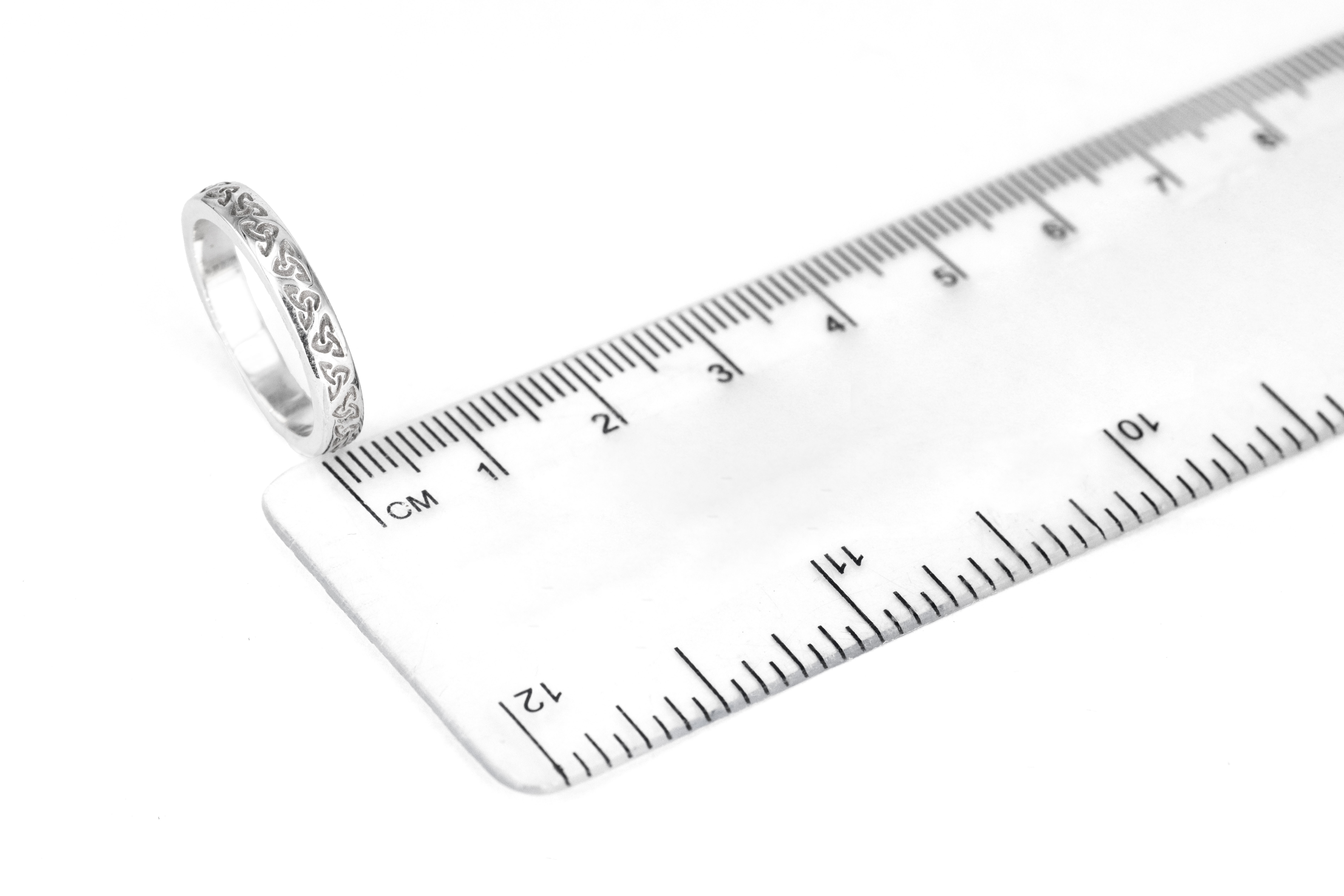 Irish White Gold Trinity Knot 3.5mm Ring For Women. Picture For Scale.