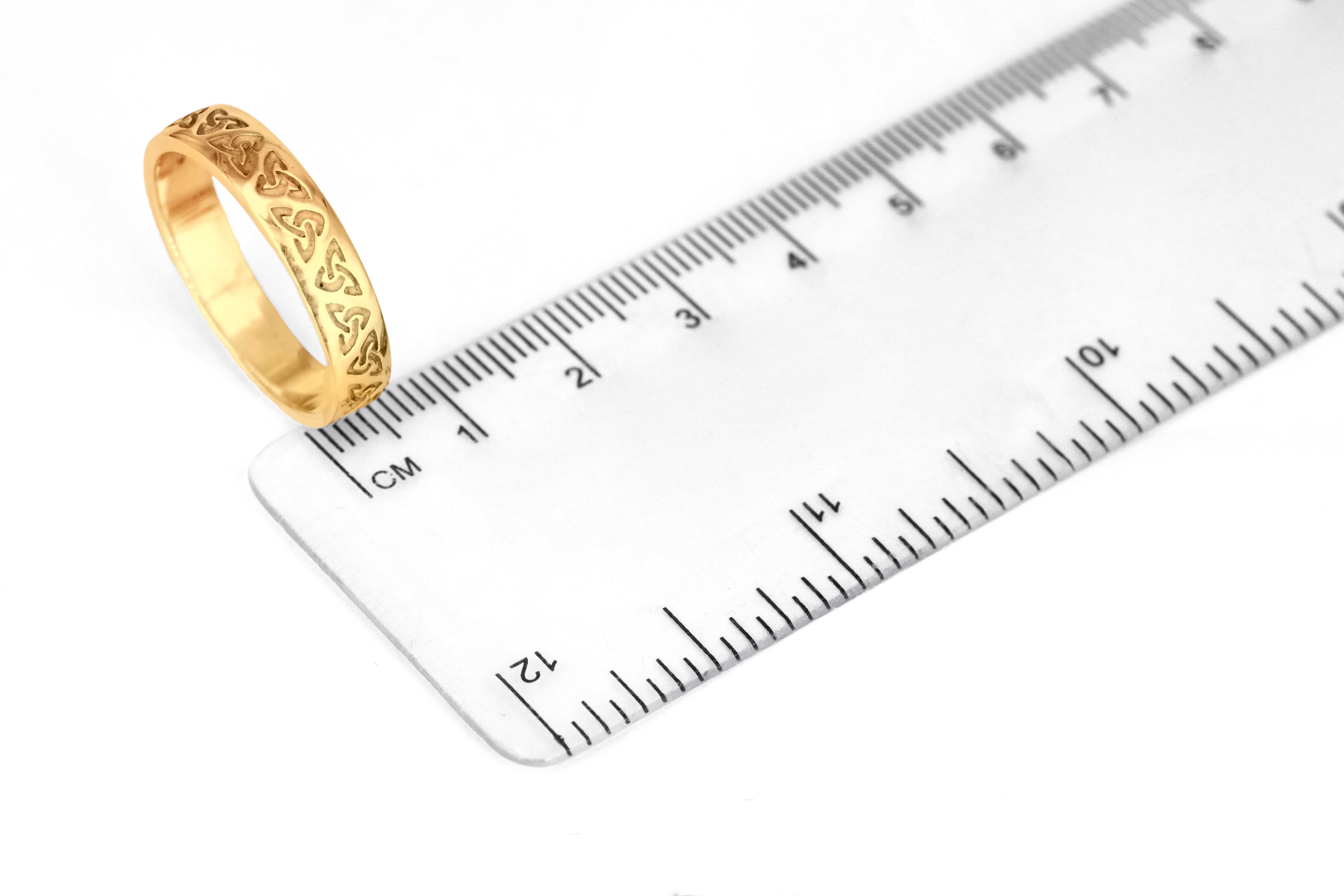 Irish 18K Yellow Gold Trinity Knot Wedding Ring For Men. Picture For Scale.