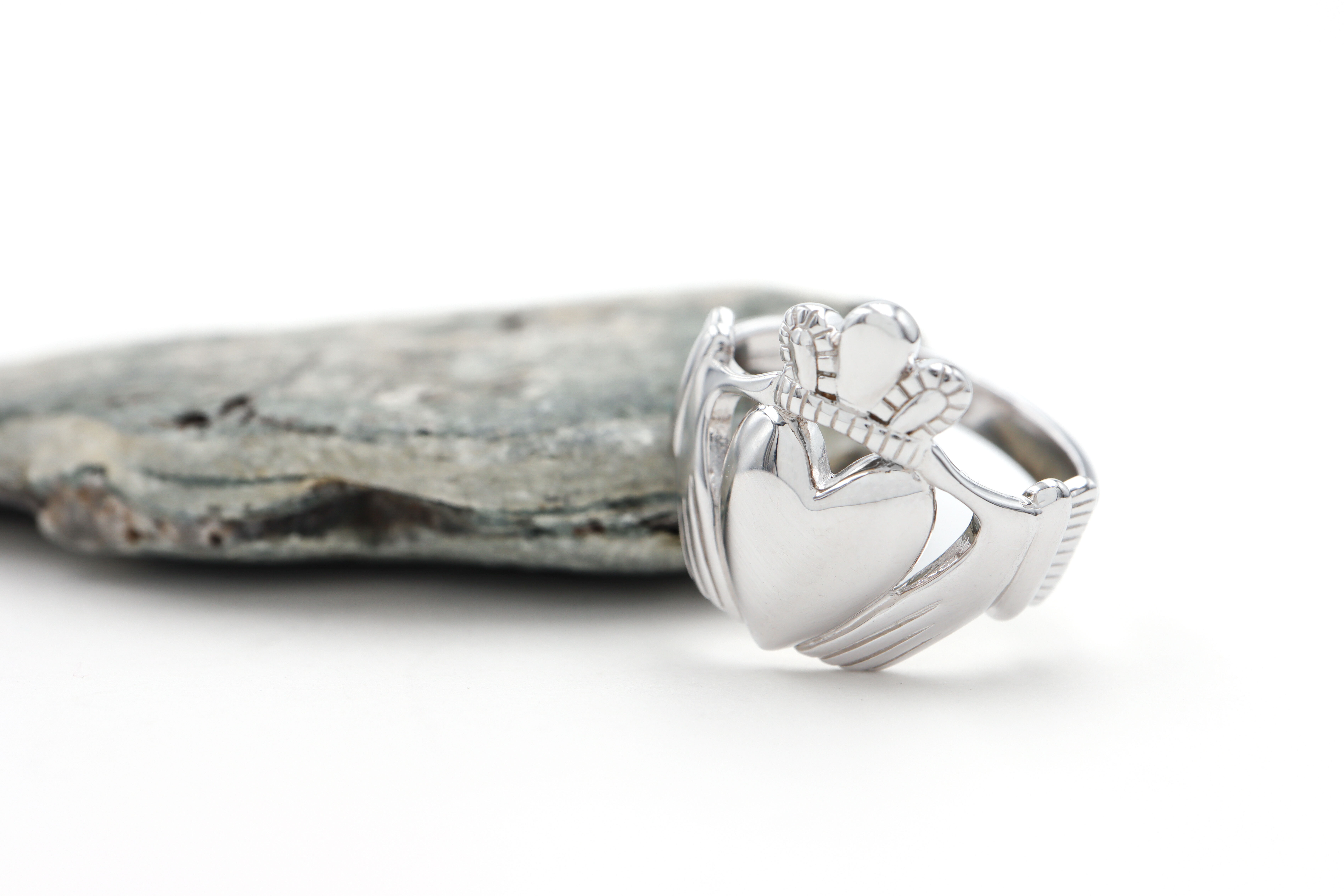 Large Authentic Sterling Silver Claddagh Ring With a Polished Finish For Men. Side View.