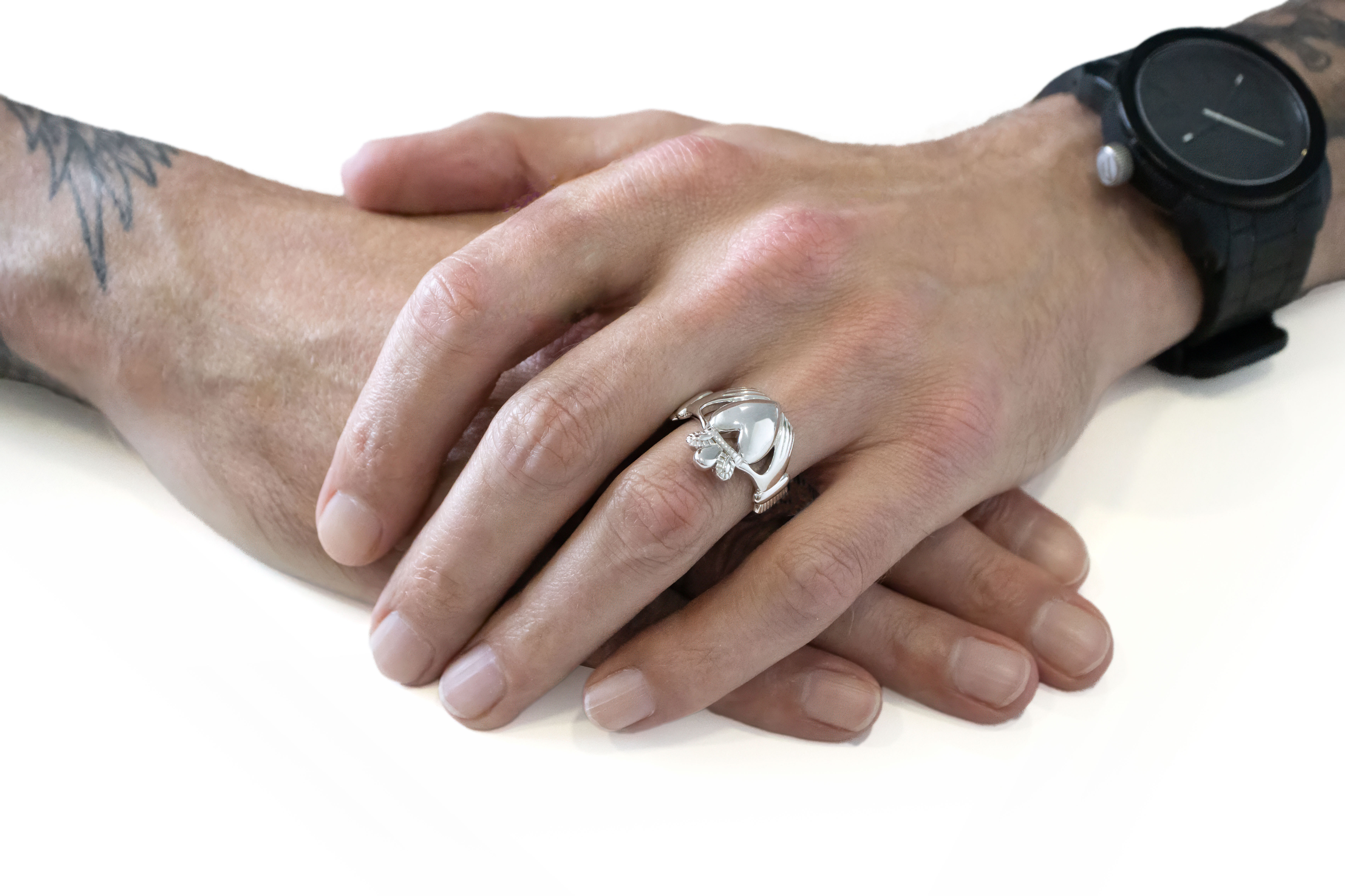 Genuine Sterling Silver Claddagh Ring With a Polished Finish For Men - Model Photo