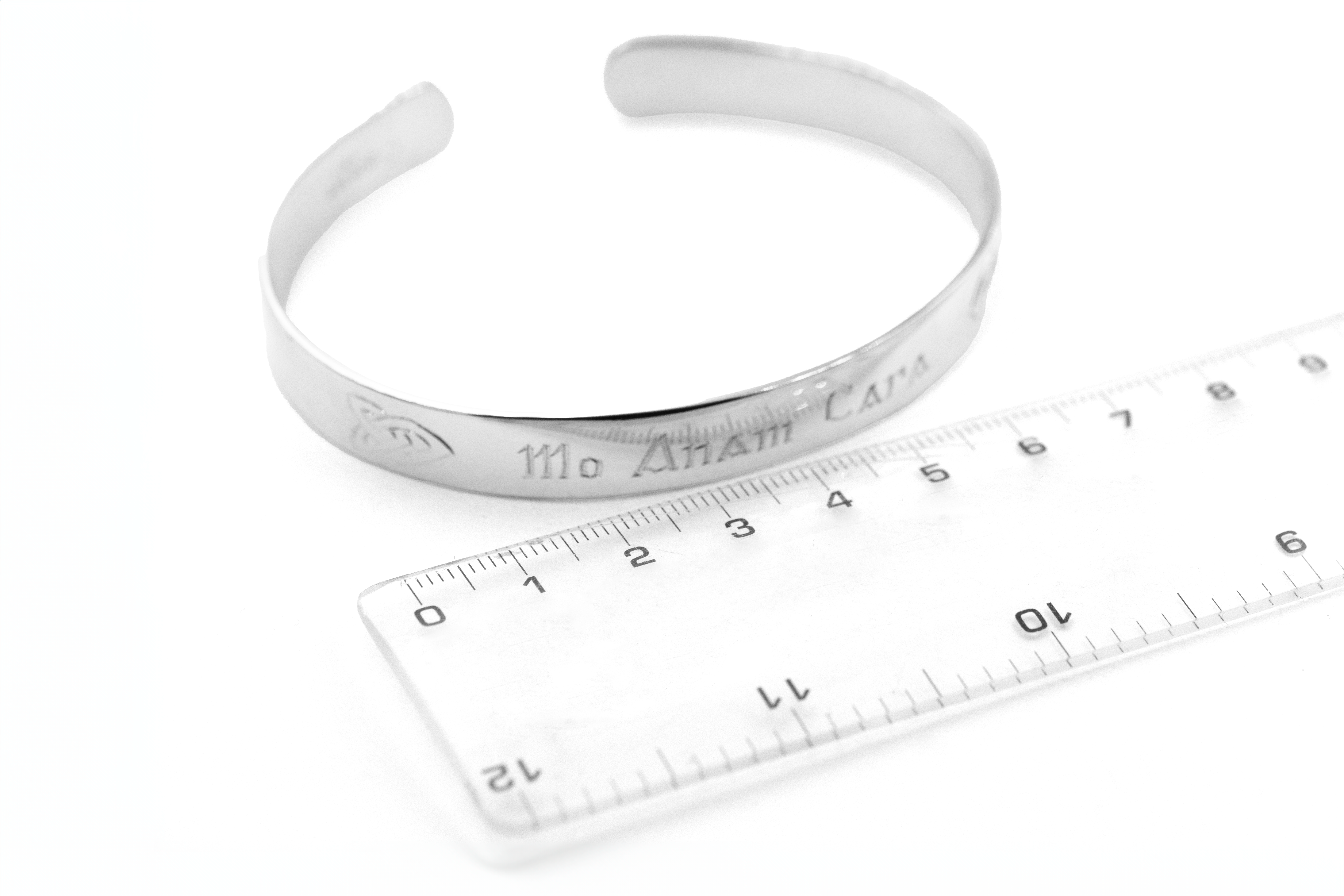 Striking Sterling Silver Gaelic & Trinity Knot Bracelet For Men With a Florentine Finish. Picture For Scale.